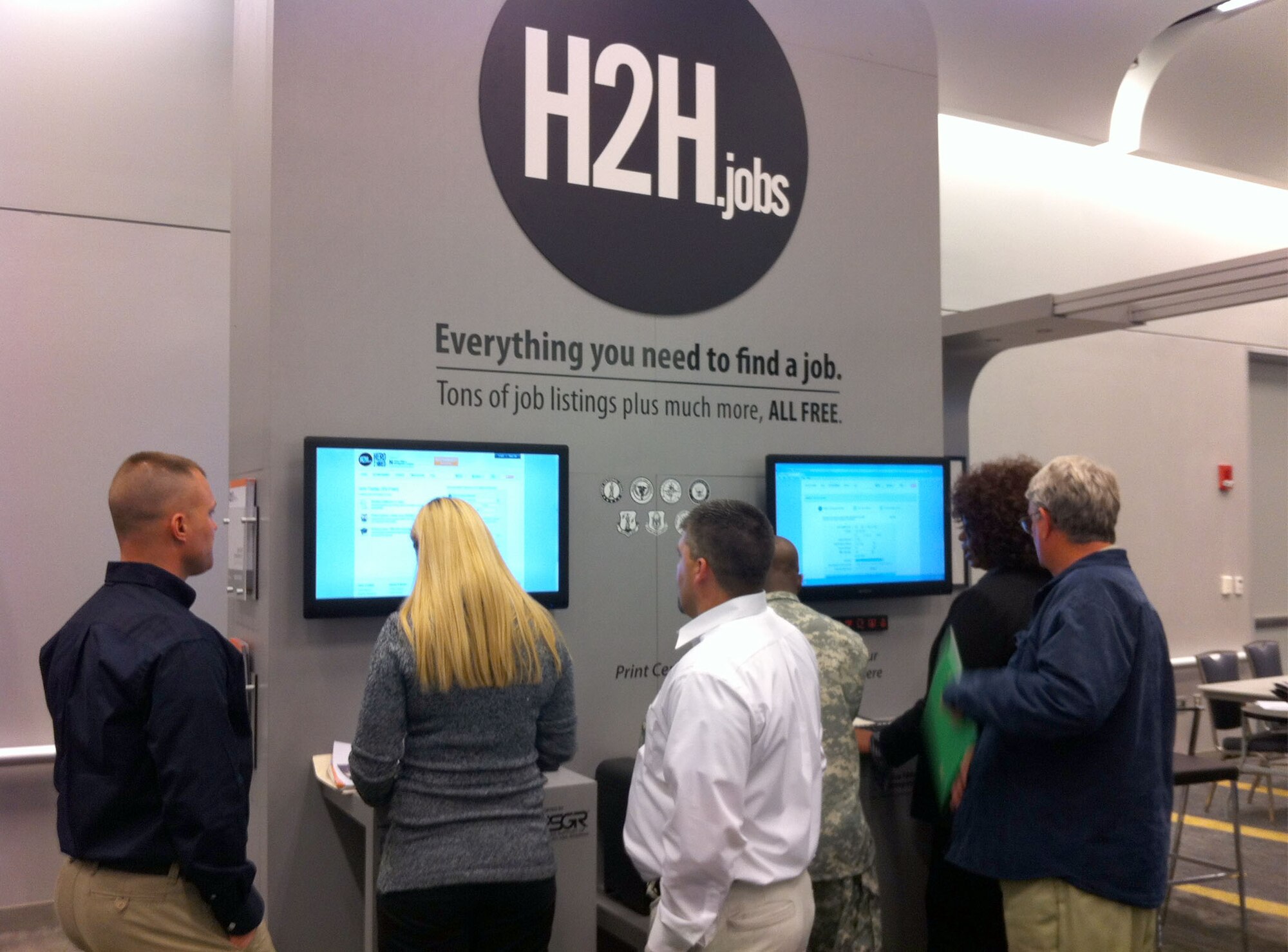 People check out H2H.jobs at a recent hiring fair. In the last year, H2H has connected more than 84,000 veterans, reserve component members and military spouses with nearly 5,000 different employers.