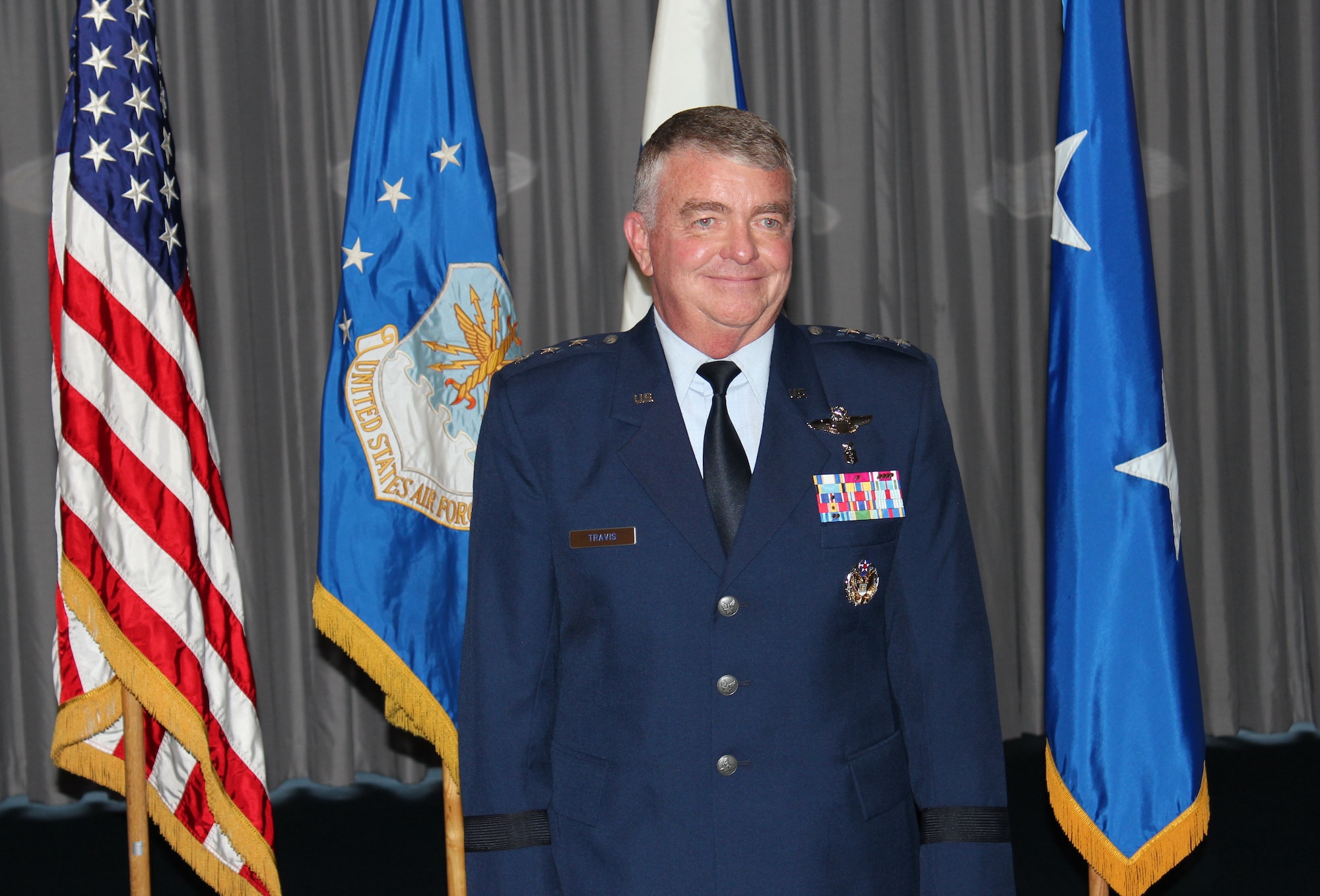 Lt. Gen. (Dr.) Thomas W. Travis, Air Force Surgeon General, is promoted during a ceremony on July 20 at the Bolling Club. (Photo by Jon Stock, U.S. Air Force)