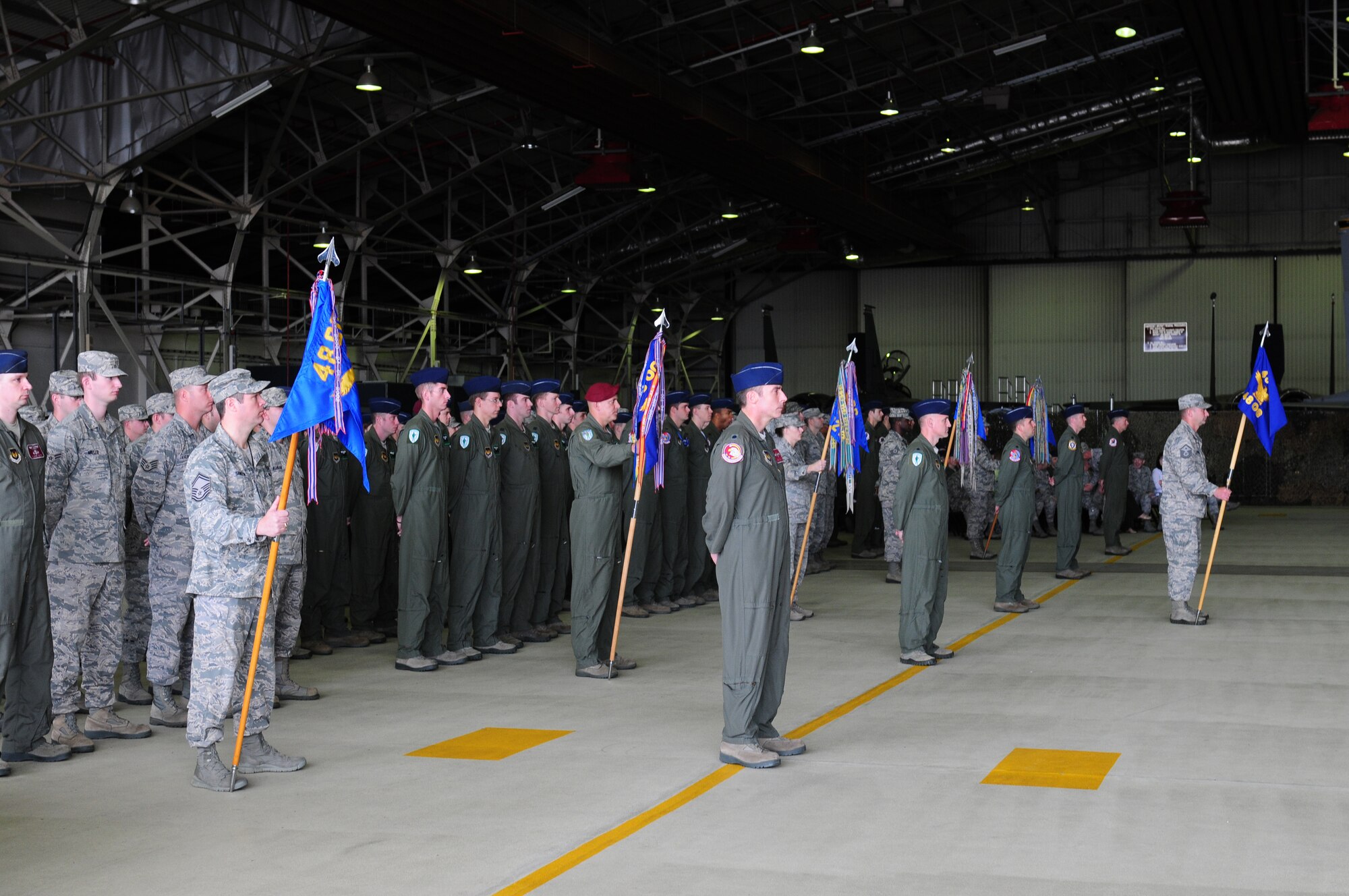ROYAL AIR FORCE LAKENHEATH, England – Airmen from the 48th Operations Group stand at parade rest during the 48th OG Assumption of Command ceremony July 20, 2012. Col. Mark Slocum assumed command of the 48th OG, which was formerly commanded by Col. Daniel Orcutt. (U.S. Air Force photo by Airman 1st Class Cory Payne)