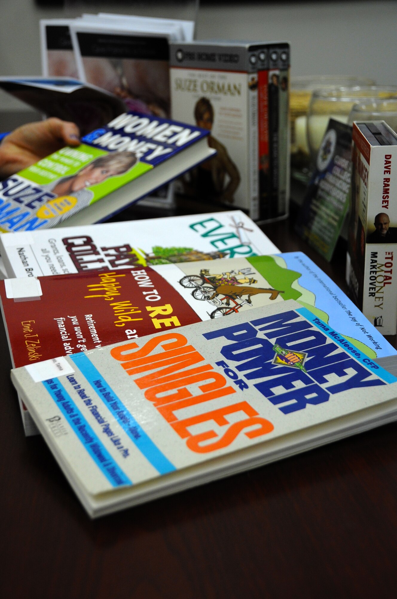 Financial books sit, ready for check out at the 35th Force Support Squadron Airman and Family Readiness July 23, 2012 at Misawa Air Base, Japan. In addition to books, there are lots of other resources including DVDs, CDs and knowledgeable staff members available to the community with their financial concerns. AFRC has many financial classes and lots of information available.  (U.S. Air Force photo by Staff Sgt. April Quintanilla)