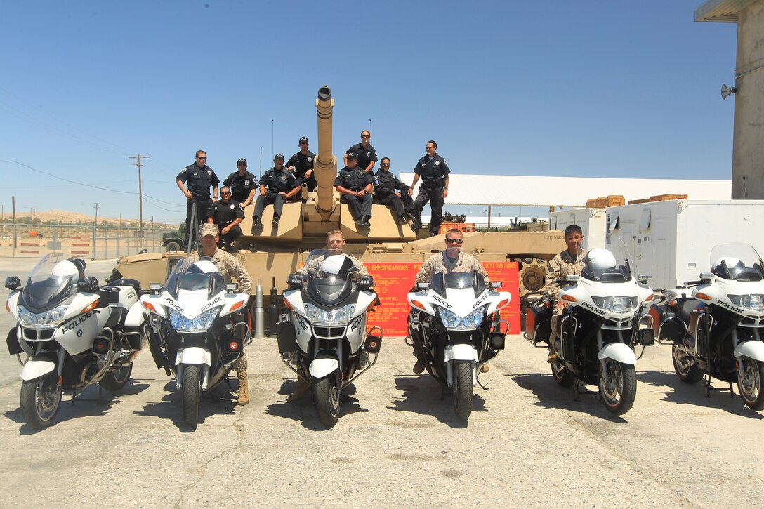 Costa Mesa Police Officers visit Marines of 1st Tank Battalion and get an inside look at the M1A1 Abrams Tank at the battalion's tank ramp June 28, 2012. The Marines also got an up close look at the officers' motorcycles. 