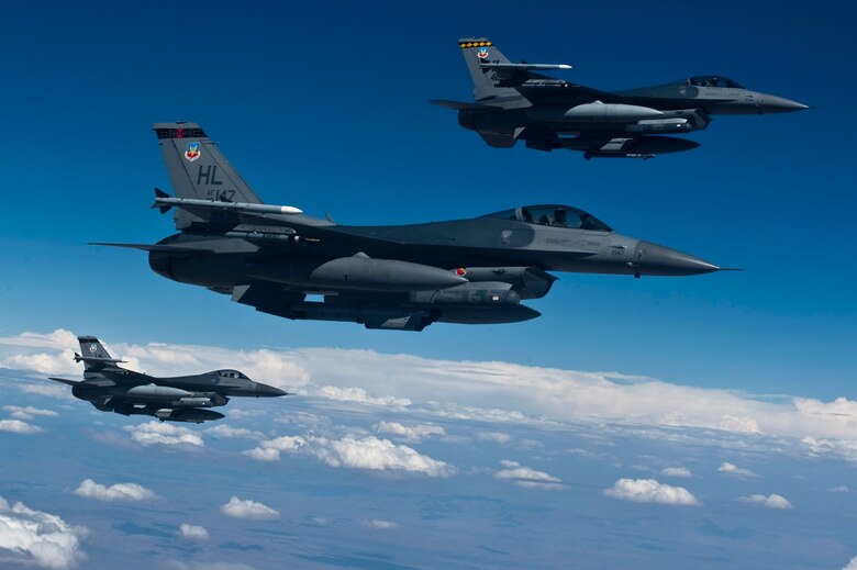 A three-ship of F-16 Fighting Falcons from the 421st Fighter Squadron, Hill Air Force Base, Utah participate in Red Flag 12-4 July 20,2012, over the Nevada Test and Training Range. The 421st FS prepares to deploy worldwide to conduct day/night air superiority and precision strike sorties employing laser-guided and inertially aided munitions during contingencies and combat. (U.S. Air Force photo by Airman 1st Class Daniel Hughes)