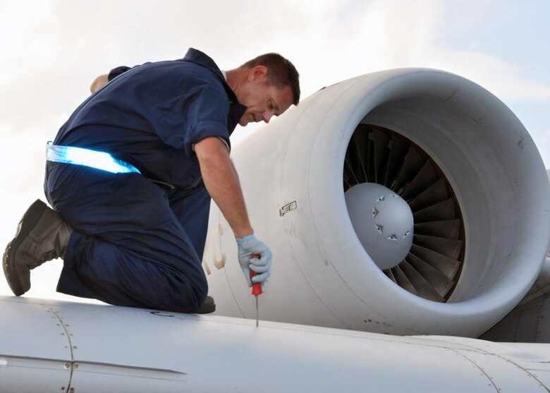 JOINT BASE PEARL HARBOR-HICKAM, Hawaii - U.S. Air Force Tech. Sgt. Kevin Krek of the 924th Maintenance Squadron at Davis-Monthan Air Force Base, Ariz., looks over the wings during a pre-flight maintenance check of an A-10 Thunderbolt II during the Rim of the Pacific exercise held June 29 through Aug. 3, 2012. Twenty-two nations, more than 40 ships and submarines, more than 200 aircraft and 25,000 personnel are participating in RIMPAC, in and around the Hawaiian Islands. The world's largest international maritime exercise, RIMPAC provides a unique training opportunity that helps participants foster and sustain the cooperative relationships that are critical to ensuring the safety of sea lanes and security on the world's oceans. RIMPAC 2012 is the 23rd exercise in the series that began in 1971. (U.S. Air Force photo by Master Sgt. Mary Hinson/NOT RELEASED)