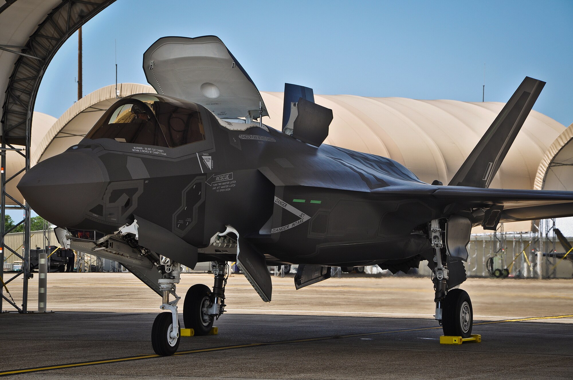 The first British F-35B Lightning II arrives at Eglin AIr Force Base, Fla., from Naval Air Station Fort Worth Joint Reserve Base, Texas, on July 23. The jet is the first of eight international partner variants of the joint strike fighter to be based at the 33rd Fighter Wing's F-35 integrated training center. British maintainers and pilots will be imbedded in Marine Fighter Attack Training Squadron 501 and the country’s pilot training begins this fall.  In the near future, they will be doing operation test preparation activity, leading the way for the U.K. to maintain the jets and becoming instructor pilots. The U.K. officially took ownership of the aircraft at a Lockheed Martin ceremony in Fort Worth, Texas, July 19.  (U.S. Air Force photo/Maj. Karen Roganov)