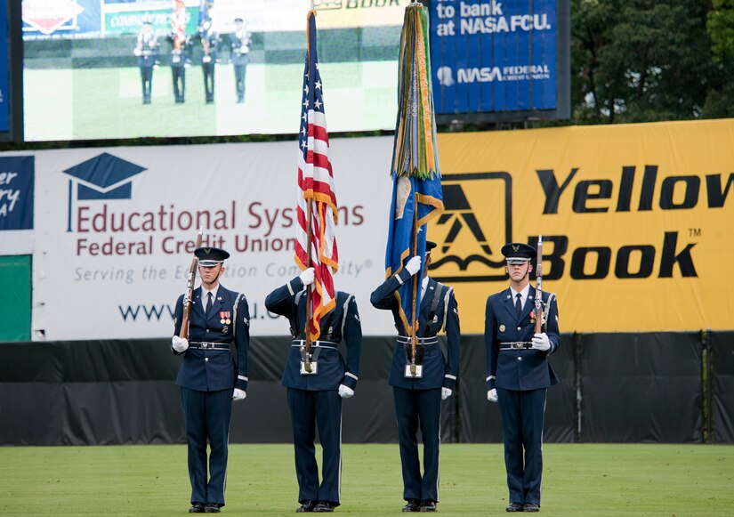 The USAF Honor Guard colors team presents the colors during the National Anthem July 20, 2012, at the Bowie Baysox stadium in Bowie, Md.  The Baysox celebrated Andrews Night and Heroes Night where Airmen, Soldiers, Sailors and Marines from Joint Base Andrews as well as Police, firefighters and first responders from the community were honored throughout  the game. (U.S. Air Force photo/Senior Airman Perry Aston)
