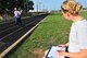 A U.S. Air Force Airman assigned to the 20th Force Support Squadron administers the running portion of the physical training test, Shaw Air Force Base, S.C., July 23, 2012.The PT process has recently been redefined and is now being applied. (U.S. Air Force photo by Airman 1st Class Ashley L. Gardner/ Released)