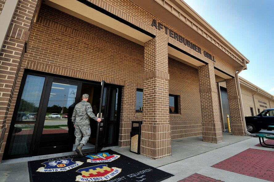 A U.S. Air Force Airman walks into the Afterburner Grill to get lunch, July 20, 2012, Shaw Air Force Base, S.C. The Afterburner Grill is Shaw’s second dining facility which offers personnel working on the flightline a more accessible facility to get lunch and dinner while continuing to support Shaw’s flying mission. (U.S. Air Force photo by Senior Airman Kenny Holston/Released)