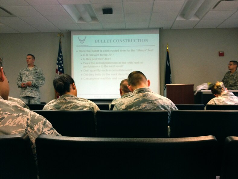 U.S. Air Force Senior Master Sgt. Frank Graziano, 20th Logistics Readiness Squadron deployment and distribution flight superintendent, speaks to Airmen at a bullet writing seminar, July 17, 2012.  Graziano passed on knowledge of bullet writing, and instructed 116 Team Shaw members. (U.S. Air Force photo by Staff Sgt. Dorothy M. Driscoll/Released)

