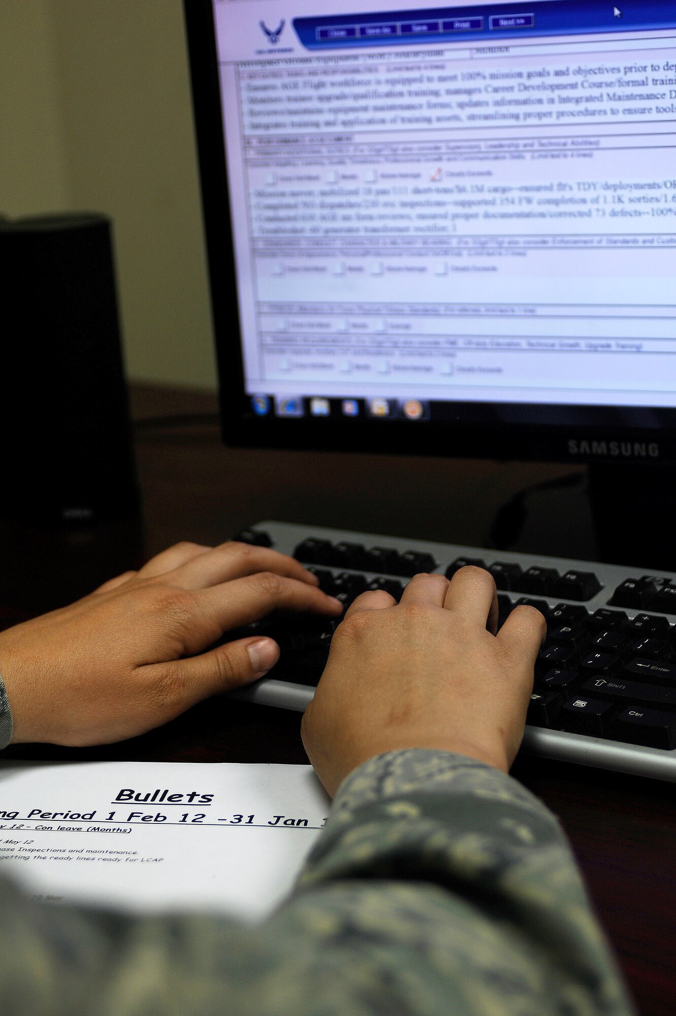 A U.S. Air Force Airman assigned to the 20th Equipment Maintenance Squadron is instructed on bullet writing, July 23, 2012, Shaw Air Force Base, S.C. A bullet writing seminar was recently taught by Senior Master Sgt. Frank Graziano, 20th Logistics Readiness Squadron deployment and distribution flight superintendent. The class offered Airmen instruction on the six steps of bullet writing. (U.S. Air Force photo by Staff Sgt. Dorothy M. Driscoll/Released)


