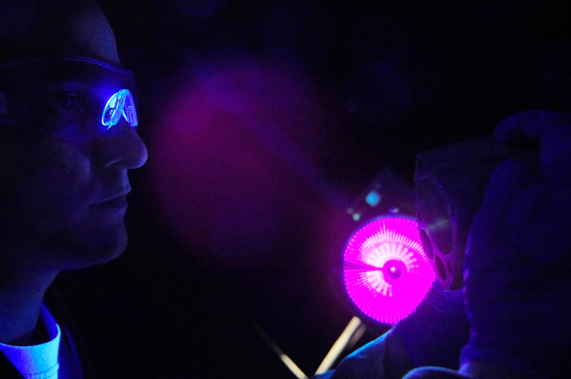RAF MILDENHALL, England – Staff Sgt. David Mazurowski, 100th Maintenance Squadron Non-Destructive Inspection craftsman, shines a black light onto a KC-135 Stratotanker accumulator during a fluorescent liquid penetrant inspection at RAF Mildenhall July 18, 2012. The black light is used to determine where the cracks in the landing gear are by making any fluorescent dye penetrant that resides in the cracks glow. (U.S. Air Force photo/Senior Airman Ethan Morgan)