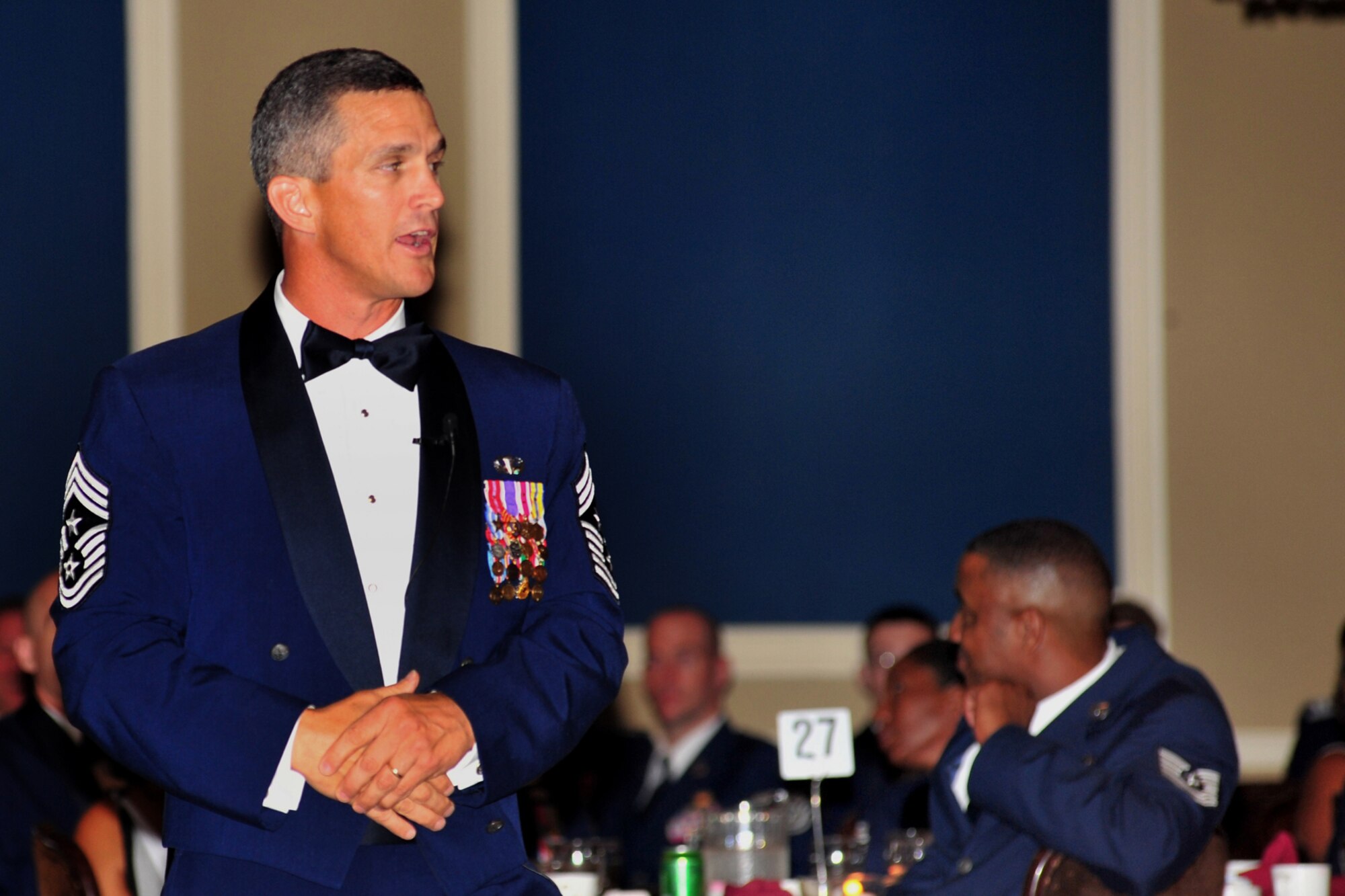 Chief Master Sgt. Richard Parsons, Command Chief Master Sergeant, Air Combat Command, speaks at the senior NCO induction ceremony July 20 at the Patriot Club on Offutt Air Force Base, Neb. During his whirlwind tour July 19-20, Parsons visited multiple base agencies, toured an RC-135V/W Rivet Joint and talked with hundreds of Airmen. (Photo by D.P. Heard)