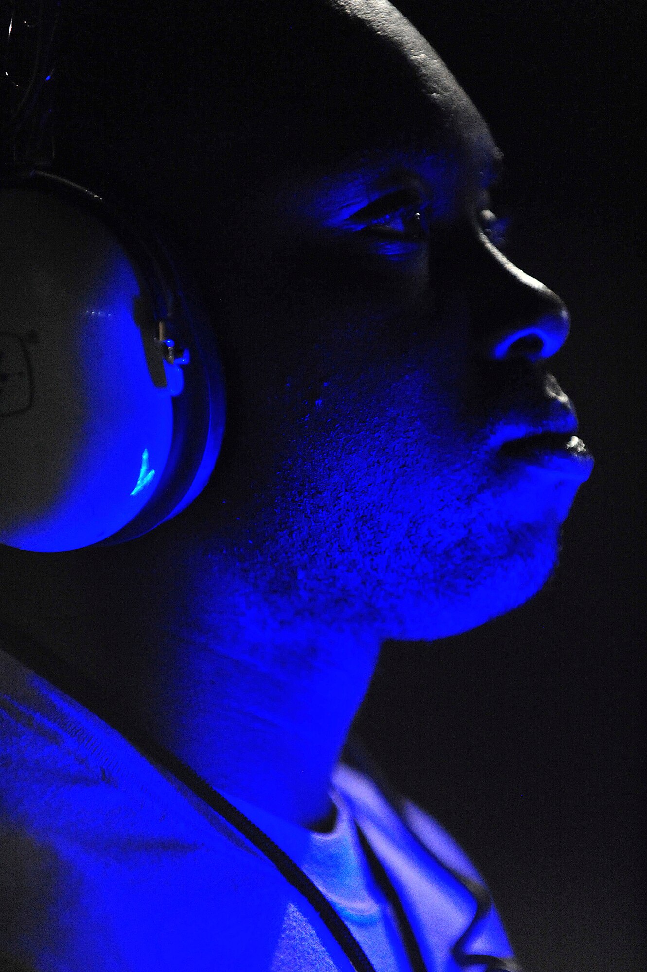 U.S. Air Force Senior Airman Donte Slocum, 23d Aircraft Maintenance Squadron, 74th Aircraft Maintenance Unit crew chief, waits for his turn to marshal the A-10C Thunderbolt II during Red Flag 12-4 at Nellis Air Force Base, Nev., July 20, 2012. The A-10 was flown by Italian air force exchange pilot Capt. Maurizio De Guida, 74th Fighter Squadron, and was the last aircraft to take off. (U.S. Air Force photo by Staff Sgt. Stephanie Mancha/Released)