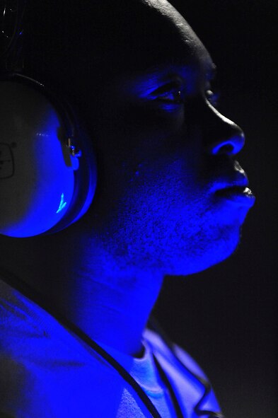 U.S. Air Force Senior Airman Donte Slocum, 23d Aircraft Maintenance Squadron, 74th Aircraft Maintenance Unit crew chief, waits for his turn to marshal the A-10C Thunderbolt II during Red Flag 12-4 at Nellis Air Force Base, Nev., July 20, 2012. The A-10 was flown by Italian air force exchange pilot Capt. Maurizio De Guida, 74th Fighter Squadron, and was the last aircraft to take off. (U.S. Air Force photo by Staff Sgt. Stephanie Mancha/Released)