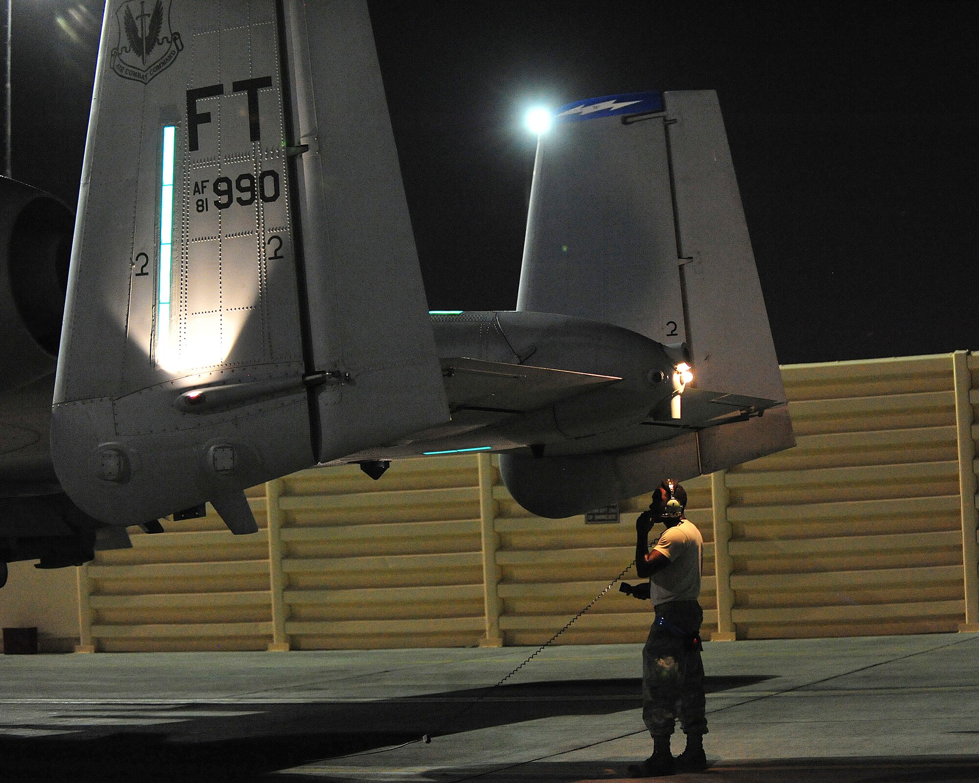 U.S. Air Force Senior Airman Donte Slocum, 23d Aircraft Maintenance Squadron, 74th Aircraft Maintenance Unit crew chief, performs a walk around inspection on a Moody AFB, Ga., A-10C Thunderbolt II at Nellis Air Force Base, Nev., July 20, 2012. Crew chiefs inspect the aircraft before and after a mission to ensure the safety of the pilot and to successfully accomplish the mission. (U.S. Air Force photo by Staff Sgt. Stephanie Mancha/Released)