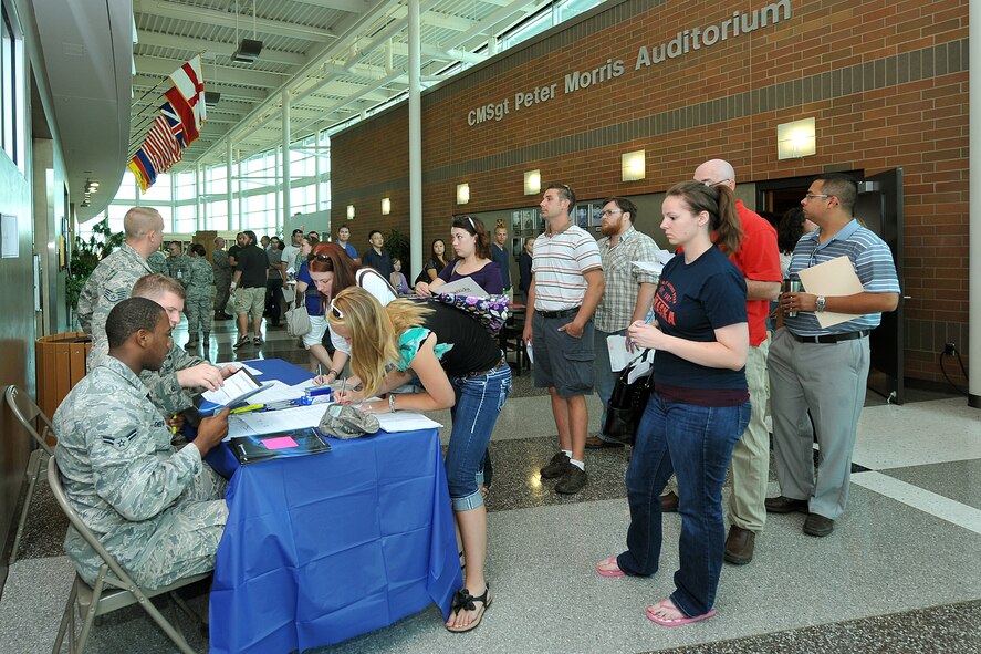 Air Force Reserve Center personnel in process U.S. Air Force Individual Ready Reserve personnel during an IRR muster at the Air Force Weather Agency headquarters July 20 on Offutt Air Force Base Neb. The IRR is comprised of former active duty or reserve military personnel who are completing their eight year mandatory service obligation. (Photo by Charles Haymond)