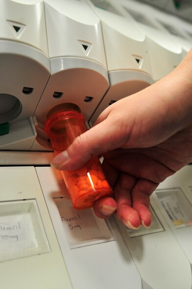 U.S. Air Force Airman 1st Class Jodi Lange, 20th Medical Group pharmacy technician, fills a prescription at Shaw Air Force Base, S.C., July 19, 2012. Personnel working at the pharmacy dispense  approximately 5,000 prescriptions per week.(U.S. Air Force photo by Airman Nicole Sikorski/Released) 