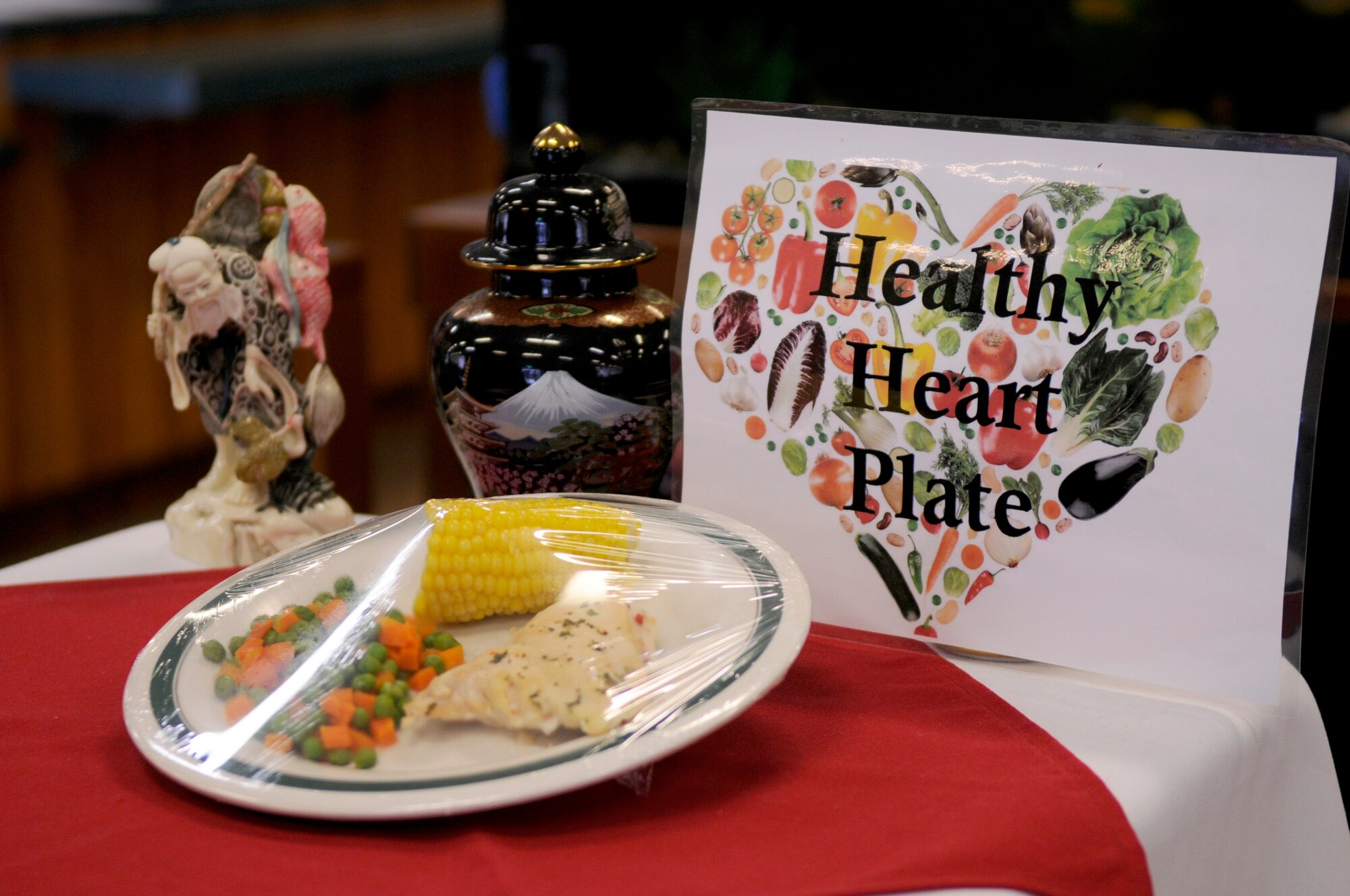 The daily Heart Healthy Plate shows the healthiest lunch combination available for that particular meal at the Marshall Dining Facility on Kadena Air Base, Japan, July 19, 2012. "Go for Green" is a new nutritional labeling system that makes it easier for Airmen to see the nutritional value of foods in the dining facility. (U.S. Air Force photo/Airman Tara A. Williamson)