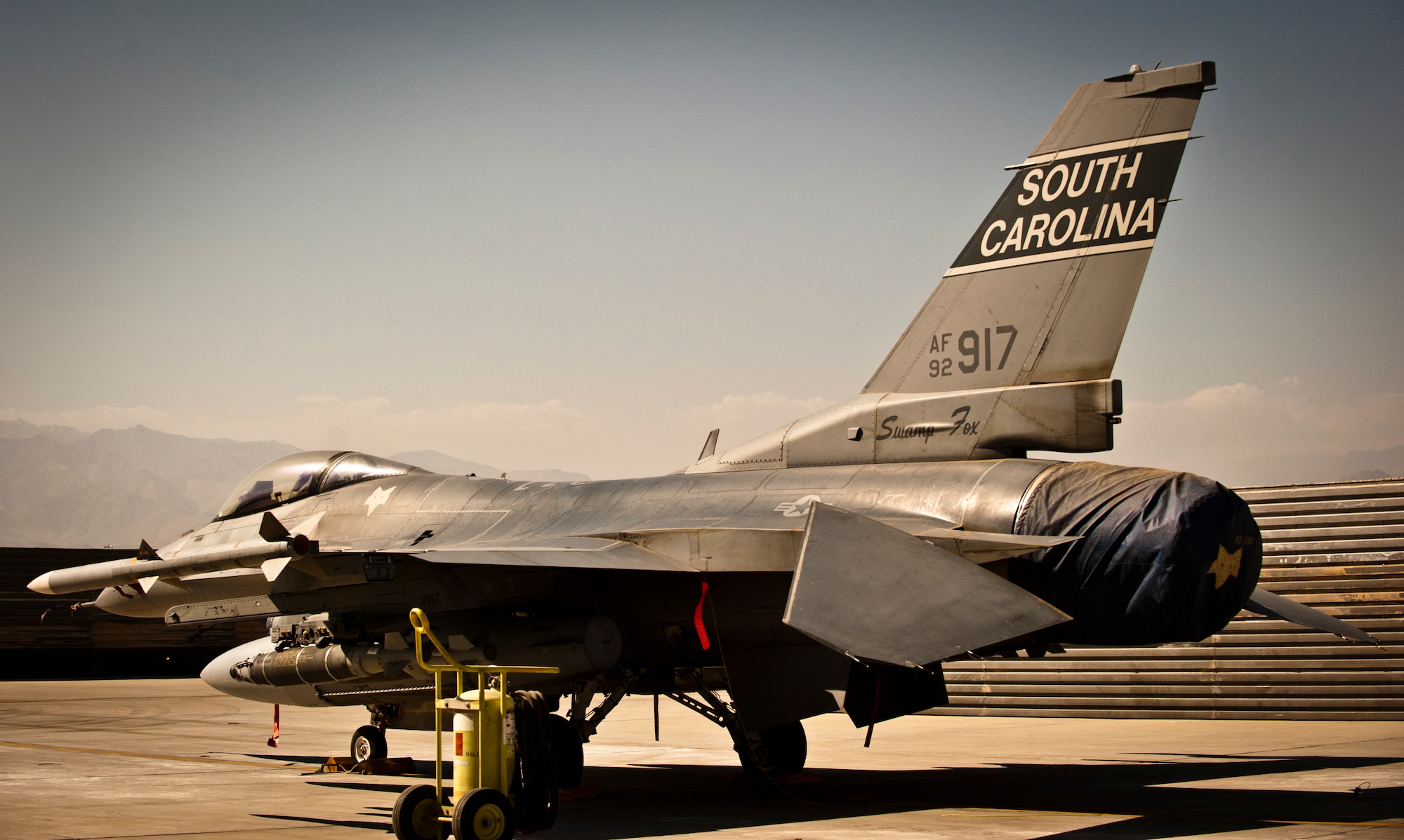 A U.S. Air Force F-16 Fighting Falcon assigned to Kandahar Airfield sits on the ramp at Bagram Airfield, Afghanistan, July 21, 2012. Bagram has hosted F-16s repeatedly over the past 10 years. (U.S. Air Force Photo/Capt. Raymond Geoffroy)
