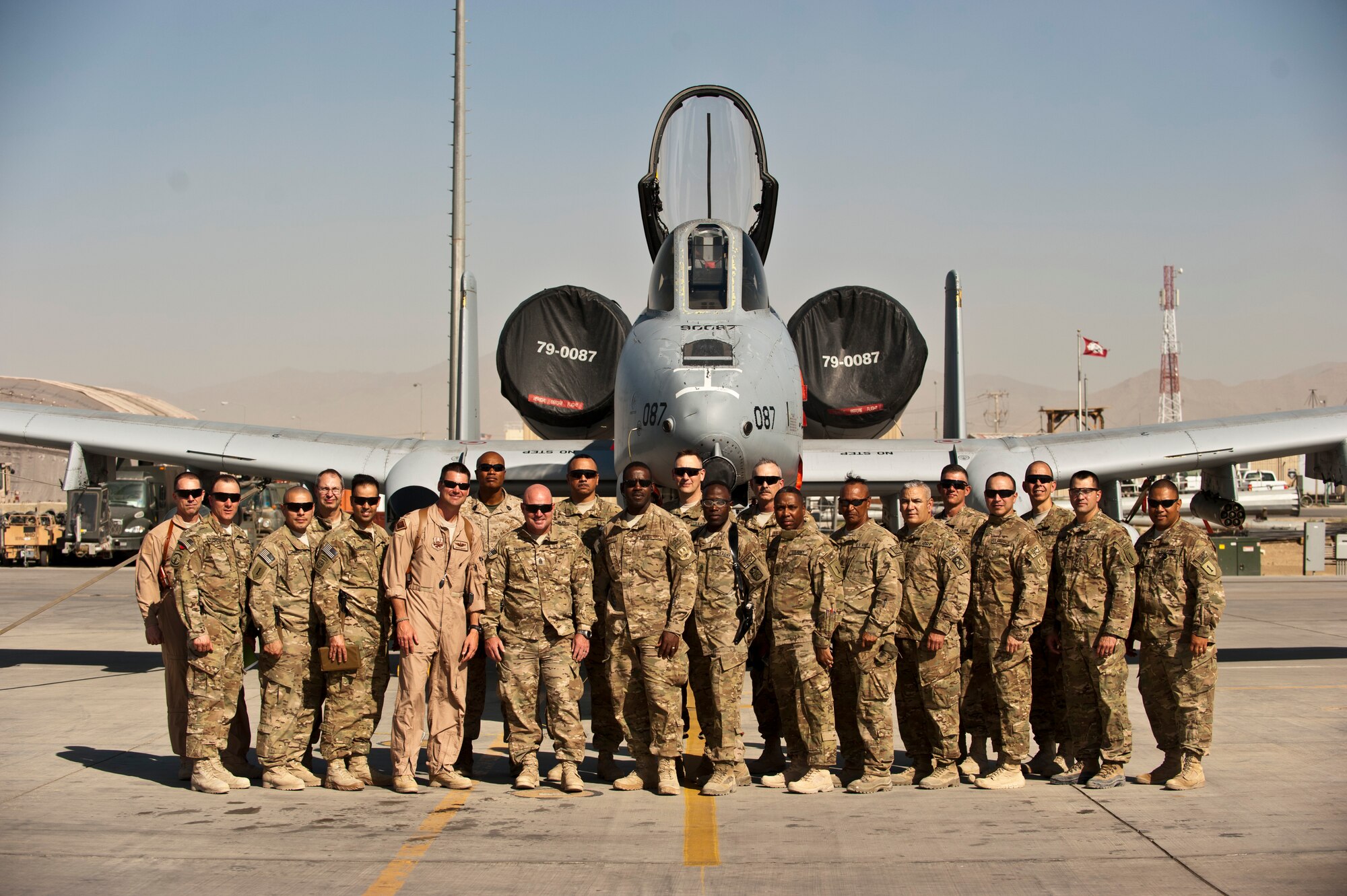 Bagram Airmen and Senior Enlisted leaders pose for a group photo in front of a U.S. Air Force A-10 Thunderbolt II during a 455 AEW orientation tour at Bagram Airfield, Afghanistan, July 21, 2012. The tour gave Bagram senior enlisted leaders insight into the contributions of Bagram Airmen. (U.S. Air Force Photo/Capt. Raymond Geoffroy)