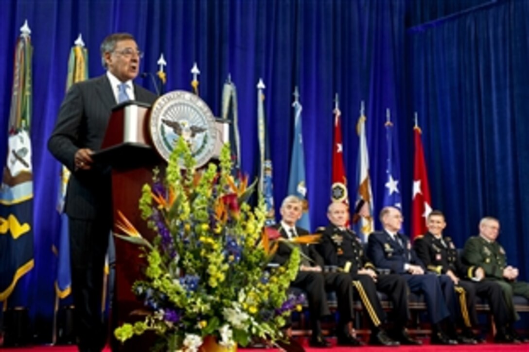 Defense Secretary Leon E. Panetta speaks during the change of directorship for the Defense Intelligence Agency on Joint Base Anacostia-Bolling in Washington, D.C., July 24, 2012. Army Lt. Gen. Ronald L. Burgess Jr., right, turned over the agency's directorship to Army Lt. Gen. Michael T. Flynn, second from right. Army Secretary John M. McHugh, left, Army Gen. Martin E. Dempsey, chairman of the Joint Chiefs, and Air Force Gen. C. Robert Kehler, commander of U.S. Strategic Command, attended.