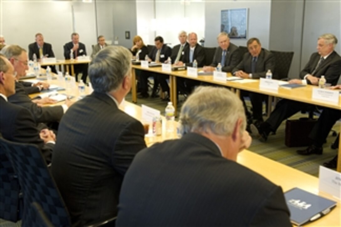 Secretary of Defense Leon E. Panetta, second from right, meets with members of the Aerospace Industries Association, National Defense Industrial Association, and Professional Services Council in Arlington, Va., on July 23, 2012.  Panetta and the group are meeting to discuss the impacts of sequestration on the Department of Defense and the defense industrial base should Congress not make an agreement within the next four months