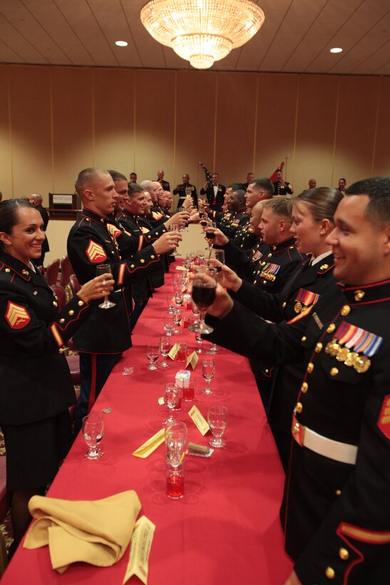 MARINE CORPS BASE CAMP PENDLETON, Calif. – Students from Class 4-12, Sergeant’s Course, Staff Non-Commissioned Officer Academy Camp Pendleton, toast during a Mess Night held aboard the Base SNCO Club, June 4, 2012. Each cycle of Sergeants Course holds a Mess Night to teach the students how one is properly conducted. (U.S. Marine Corps photo by Sgt. Christopher O’Quin/Released)