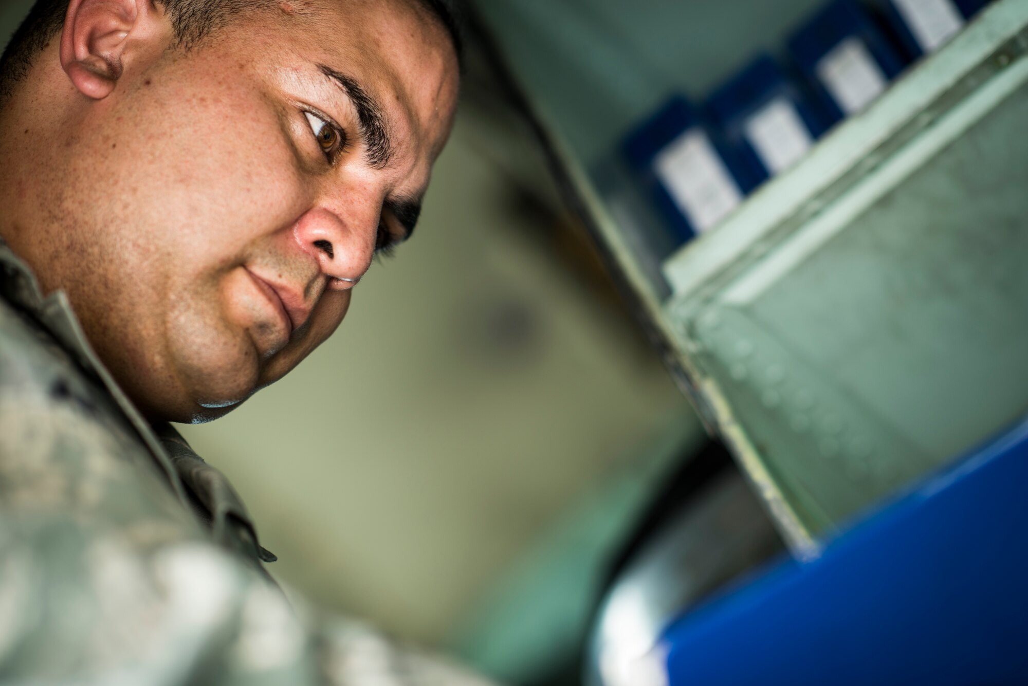 YOKOTA AIR BASE, Japan -- Staff Sgt. Galen Apo, 374th Maintenance Group quality assurance inspector, performs an aircraft forms inspection on a C-130 Hercules at Yokota Air Base, Japan, July 25, 2012. The MXG QA section was highlighted as one of Yokota's Outstanding Teams during the Consolidated Unit Inspection earlier that year. (U.S. Air Force photo/Tech. Sgt. Samuel Morse)