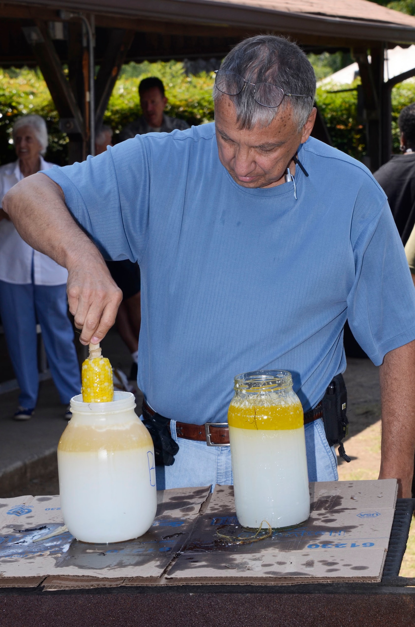Personnel were treated to lunch of roasted ears of corn and bratwurst at the Dobbins Annual Corn and Sausage Roast held at the base lake July 18. The proceeds are donated to the Dobbins Family Readiness Programs. (U.S. Air Force photo/Don Peek)