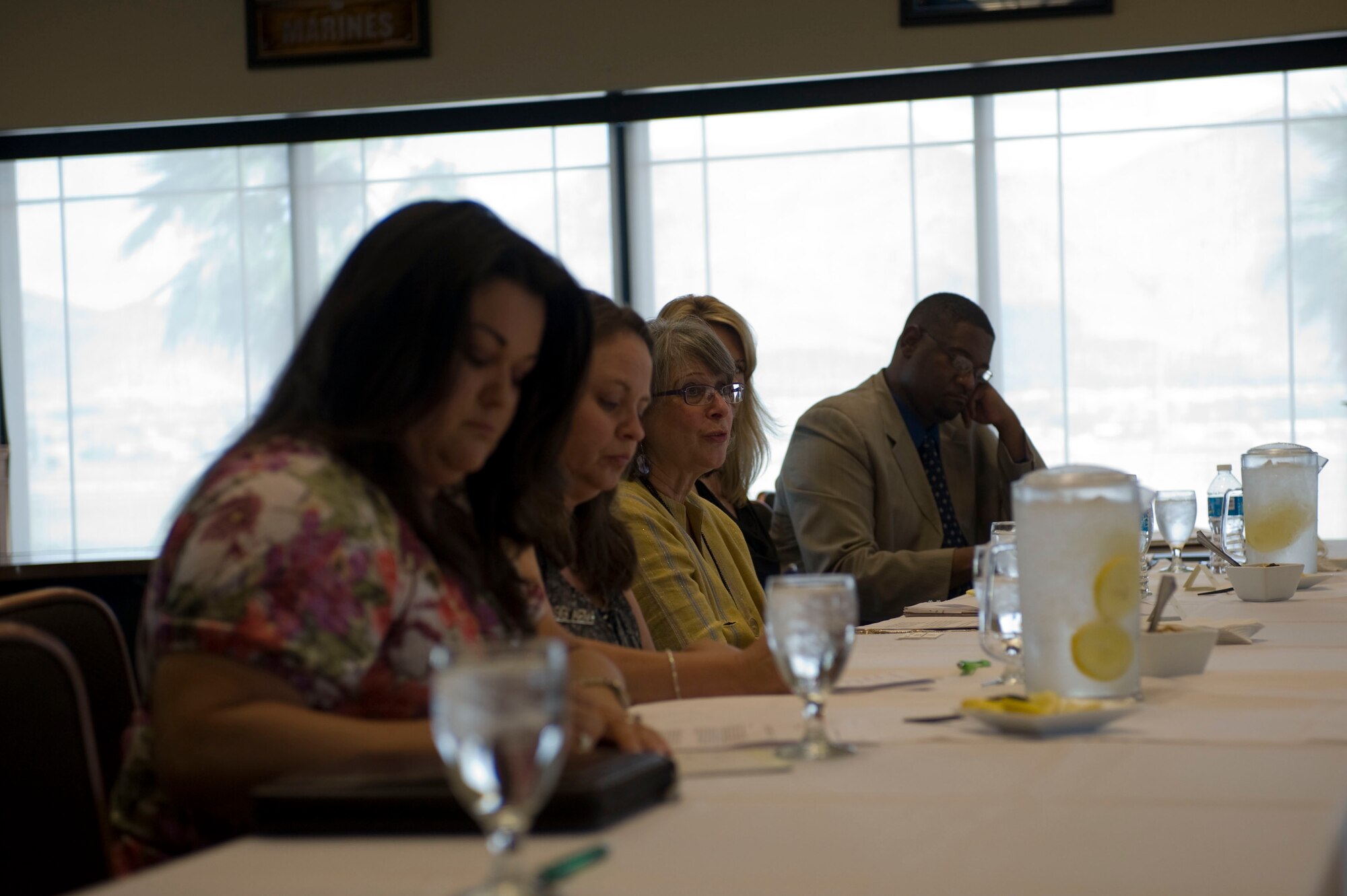 Dr. Karen Gross, United Sates Department of Education senior policy advisor, and military spouses discuss issues regarding military members and their families during a roundtable meeting July 24, 2012, at Nellis Air Force Base, Nev. Raised in New England, Gross is a cum laude graduate of Smith College where she was elected to Phi Beta Kappa and a cum laude graduate of Temple University School of Law, having spent her final year of law school at the University of Chicago.  (U.S. Air Force photo by Airman 1st Class Christopher Tam)