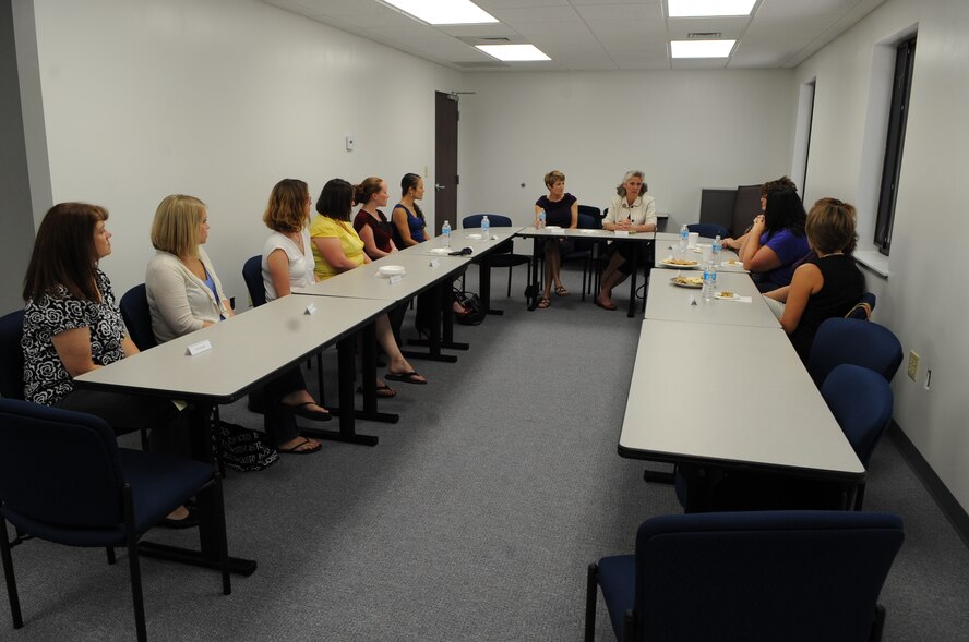 Jan Green, spouse of U.S. Air Force Col. Gabriel Green, 4th Fighter Wing vice commander, and Kathy Wells, spouse of Maj. Gen. Wells, 9th Air Force commander, speak to spouses of enlisted Airmen during a tour on Seymour Johnson Air Force Base, N.C., July 16, 2012. The spouses discussed several topics to include housing, spouse organizations and deployments. (U.S. Air Force photo/Airman 1st Class Aubrey Robinson/Released)