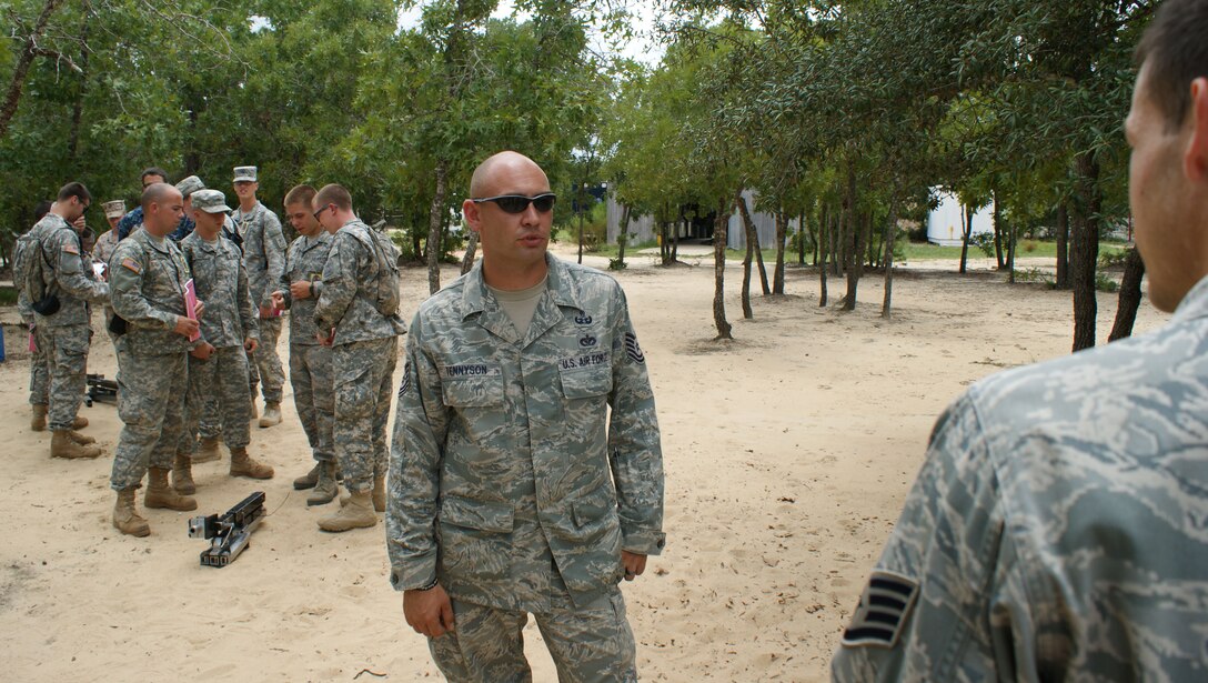 Tech. Sgt. Ryan Tennyson, AETC's 2011 NCO Instructor of the Year, prepares to teach a block of instruction in the Improvised Explosive Device division at Naval School Explosive Ordnance School, Eglin Air Force Base, Fla., on Jul. 20, 2012.  Tennyson is wrapping up his tour as EOD instructor, heading to Spangdahlem Air Base, Germany in the fall. (U.S. Air Force photo/Dan Hawkins)