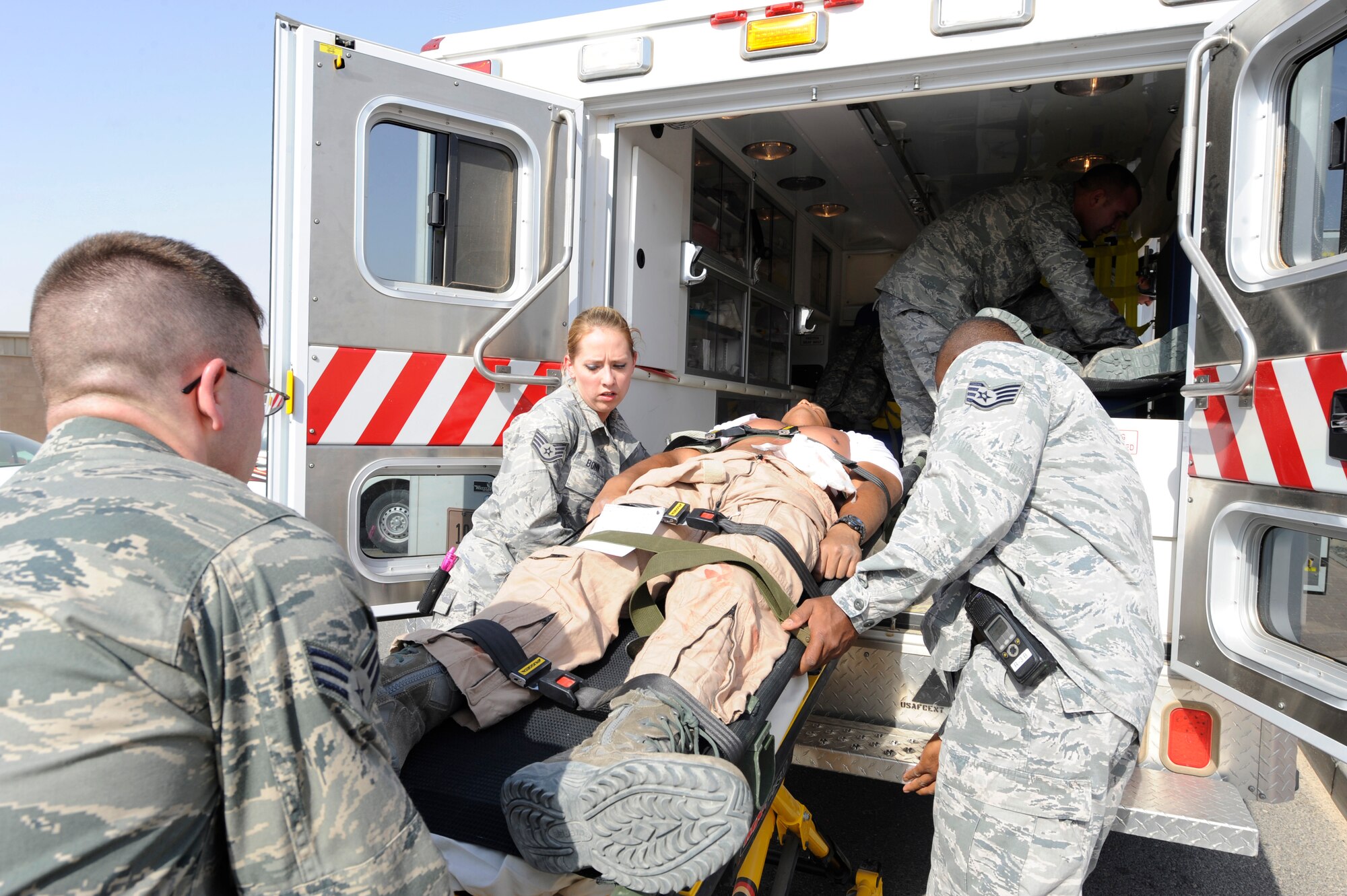 SOUTHWEST ASIA – Members of the 386th Expeditionary Medical Squadron respond to an active-shooter exercise here July 23. The exercise tested emergency responder’s ability to coordinate accurate and timely response procedures to an active-shooter scenario in a simulated environment. (U.S. Air Force photo/Staff Sgt. Alexandra M. Boutte)