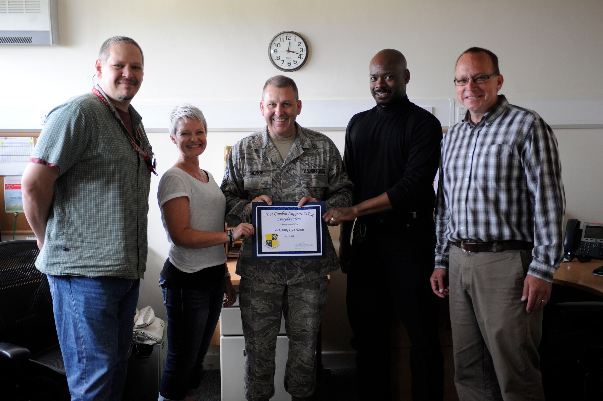 Eric Ferguson, Mike Gunnoe, Vic Jones, Evan Streeter, Shandra Watson, and Nancy Wick from the 421st Air Base Squadron Client Systems Administrators Team were named the July 501st CSW Everyday Hero from the 421st ABS. 

The CSA Team afforded exceptional NIPRNet support to a RAF Menwith Hill NSA customer for the multi-million dollar Phoenix operation facility. (U.S. Air Force photo by Staff Sgt. Brok McCarthy)