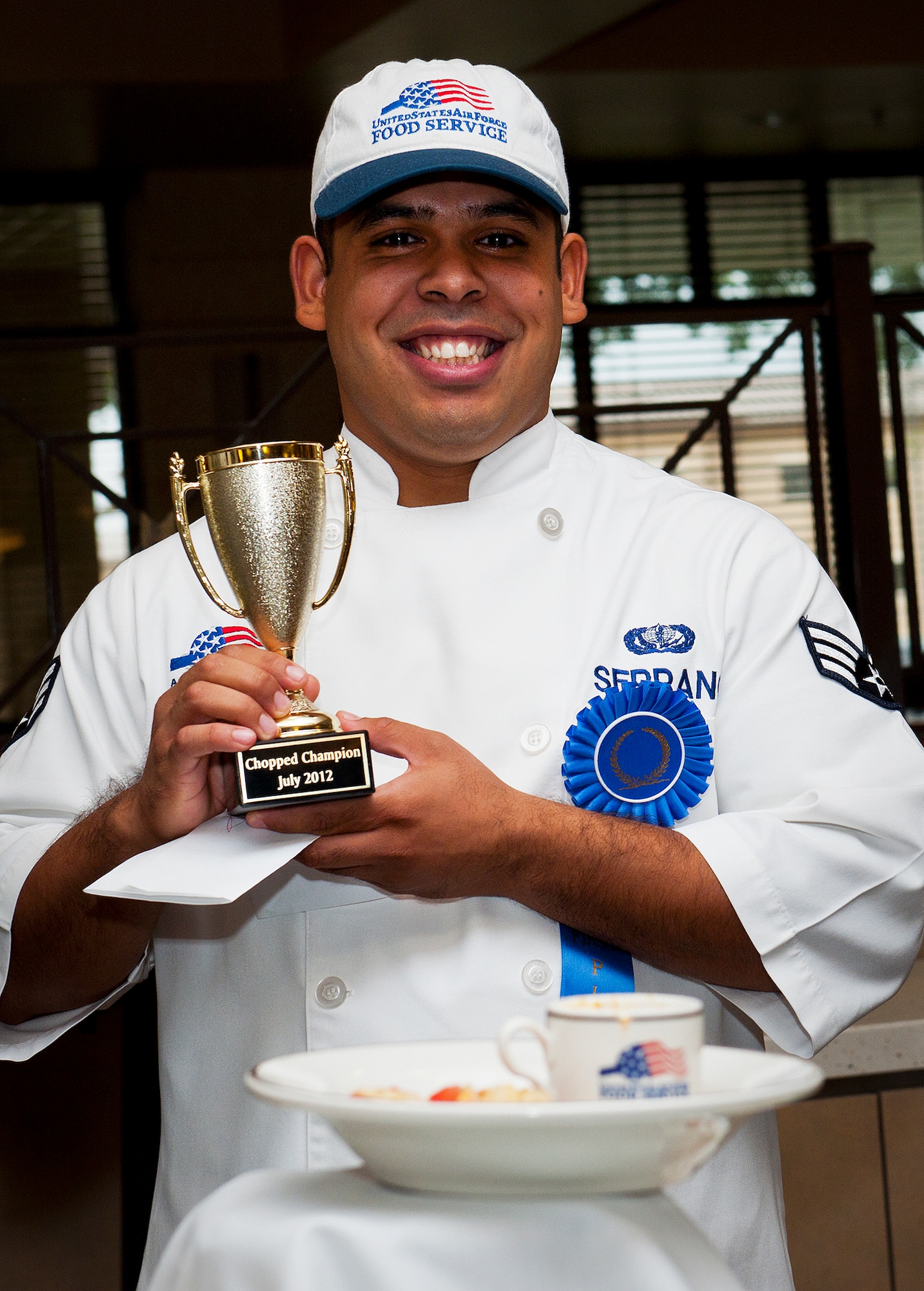 Senior Airman Gamaliel Serrano won the base’s first “Chopped” cooking competition July 24 at Eglin.  Five Airmen from the 96th Force Support Squadron had an hour to cook a meal with three secret ingredients.  (U.S. Air Force photo/Samuel King Jr.)