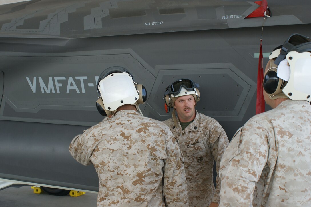 Students learn about the F-35 Lightning II joint strike fighter from USMC Staff Sgt. Christopher Johnson (2nd from left) during training at Eglin Air Force Base, Fla., Jul. 19, 2012.  The USMC is standing up their first-ever field training detachment with the 372nd Training Squadron Detachment 19 at Eglin, part of the 982nd Training Group at Sheppard Air Force Base, Texas. (U.S. Air Force photo/Dan Hawkins)