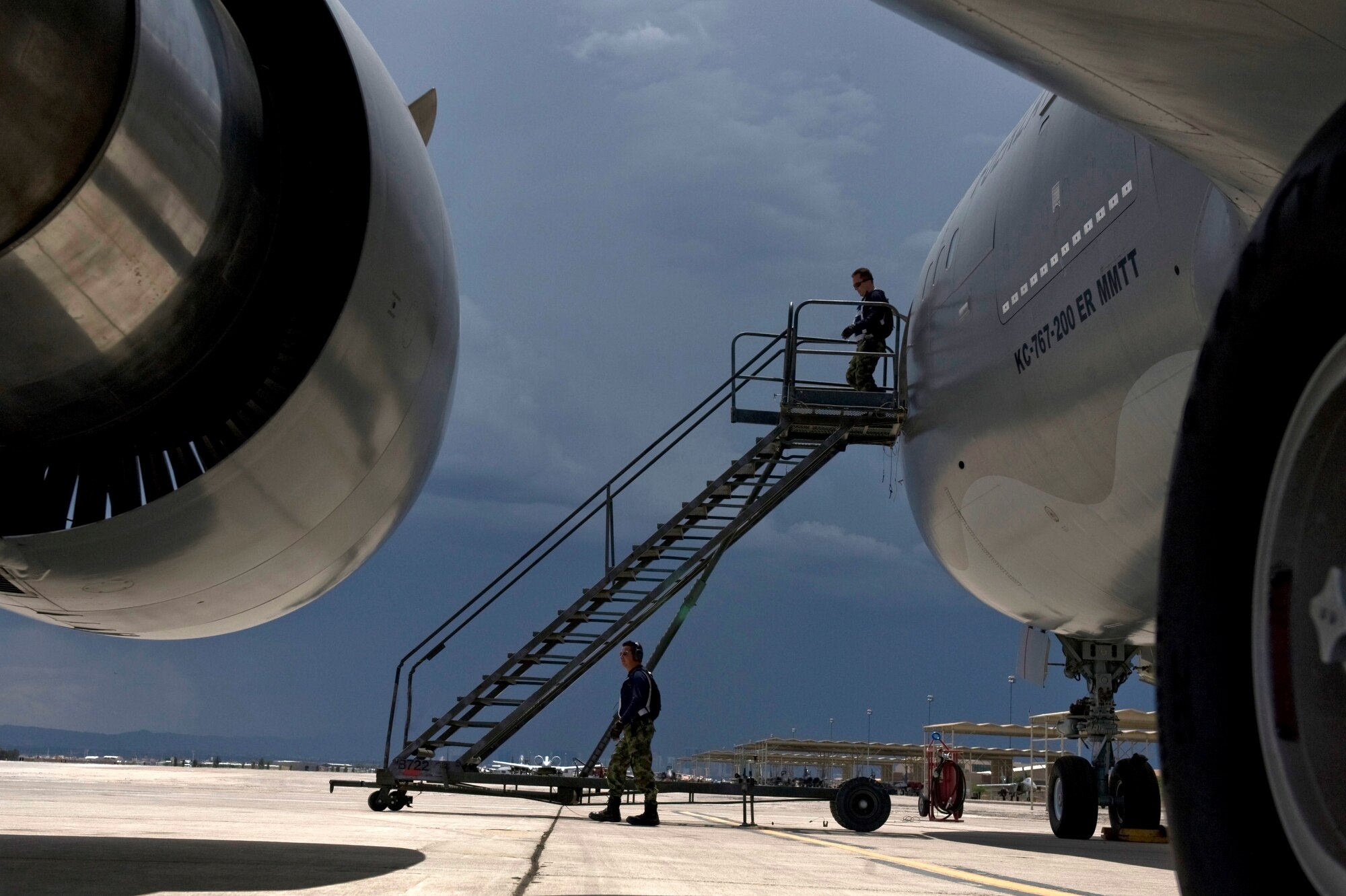Colombian air force maintainers prepare a Colombian Boeing KC-767 multi-mission tanker transport jet during Red Flag 12-4 July 23, 2012, at Nellis Air Force Base, Nev. The Israel Aerospace Industries completed modification of the first 767 MMTT in June 2010, with changes including the addition of wing refueling pods and a side cargo door. (U.S. Air Force photo by Airman 1st Class Daniel Hughes)