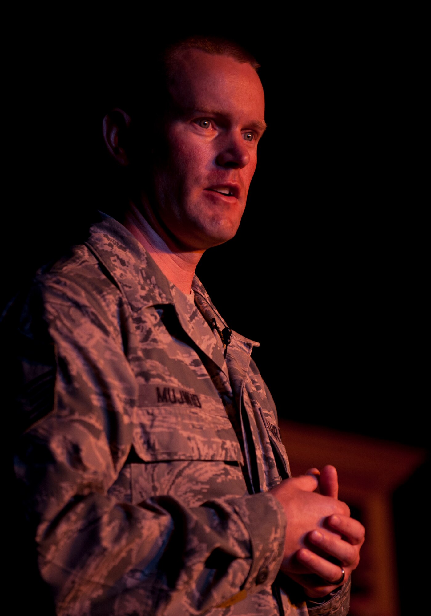 Senior Master Sgt. Michael Mujwid, 39th Medical Group first sergeant, shares how he dealt with post-traumatic stress disorder after a deployment and how two fellow senior NCOs helped him through his depression during the Storytellers event July 19, 2012, at Incirlik Air Base, Turkey. Storytellers offers Incirlik residents a chance to hear other Airmen's life defining stories and learn from their experiences. The event was created by members of the Incirlik Toastmasters Club in response to an open question from Chief Master Sgt. of the Air Force James Roy on how to create community connections and open dialogue among Airmen. (U.S. Air Force photo by Senior Airman Clayton Lenhardt/Released)