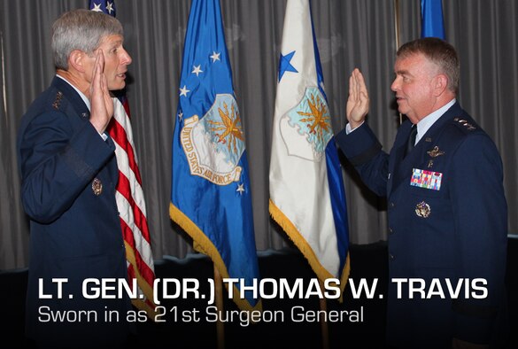 Air Force Chief of Staff Gen. Norton A. Schwartz officiates the promotion of Lt. Gen. (Dr.) Thomas W. Travis, Air Force Surgeon General, during a ceremony on July 20 at the Bolling Club. (Air Force photo by Jon Stock)