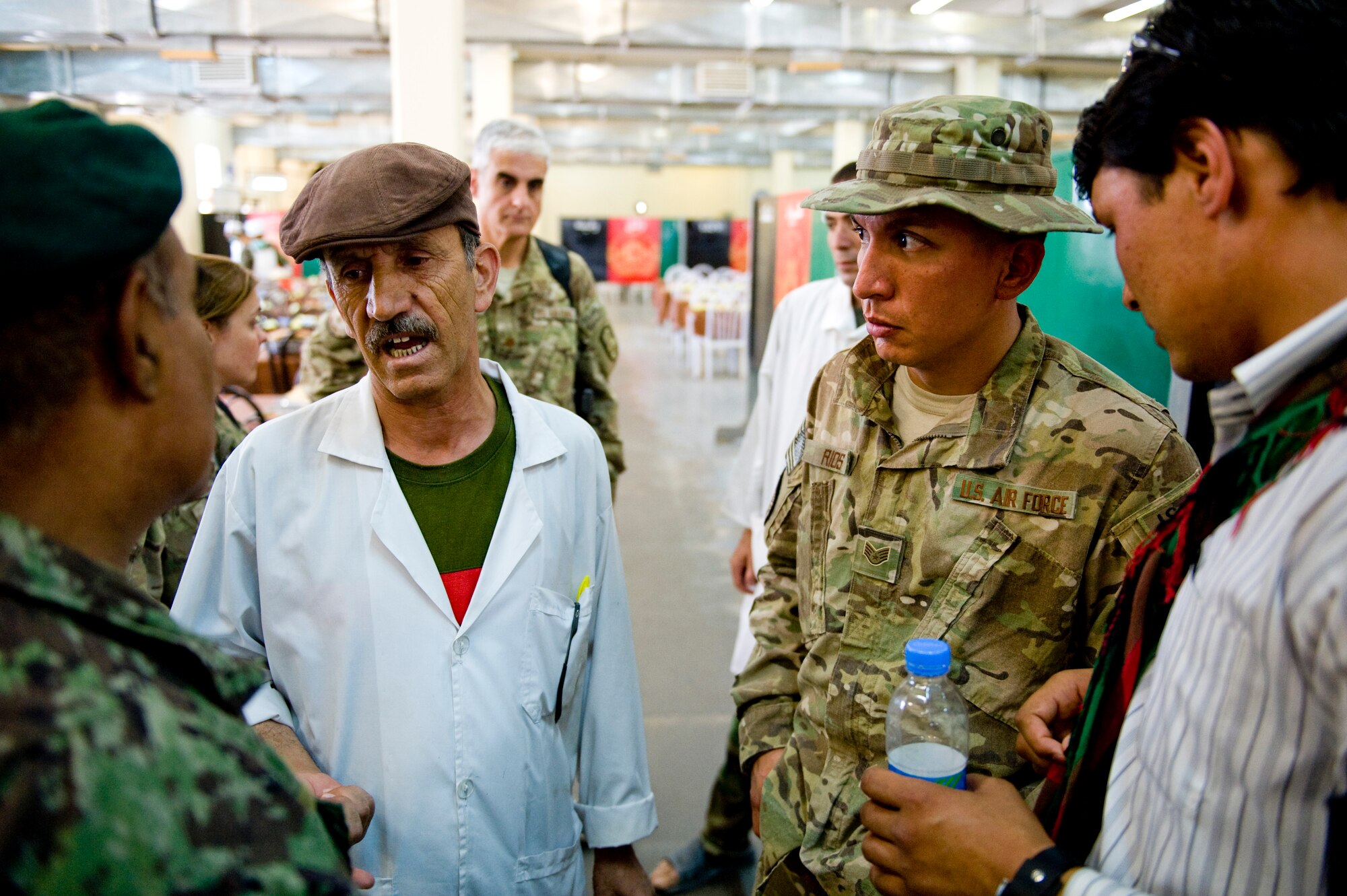 U.S. Air Force Staff Sgt. Anthony Rios, preventive medicine mentors with the Joint Medical Operations Center, inspects an Afghan military dining facility, Camp Stone, Afghanistan, July 14, 2012. The JMOC assists Afghans in developing a sustainable medical support system. (U.S. Air Force photo by Staff Sgt. Greg C. Biondo)(Released)