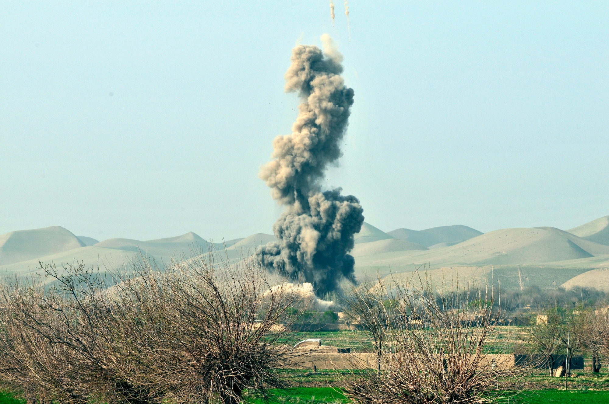 BALA MURGHAB, Afghanistan – An insurgent compound explodes after a Air Force B-1 Lancer drops a 38GBU bomb on the facility in northern Bala Murghab Valley, Badghis Province, Afghanistan April 4, 2011. The B-1 responded as a close-air support asset and assisted 7th Squadron, 10th Cavalry Regiment scouts from Bulldog Troop’s Red Platoon in a sustained combat engagement, which resulted in the destruction of insurgent strongholds and improvised explosive device making facilities. This photo was originally released April 7, 2011. (U.S. Air Force photo/Master Sgt. Kevin Wallace)