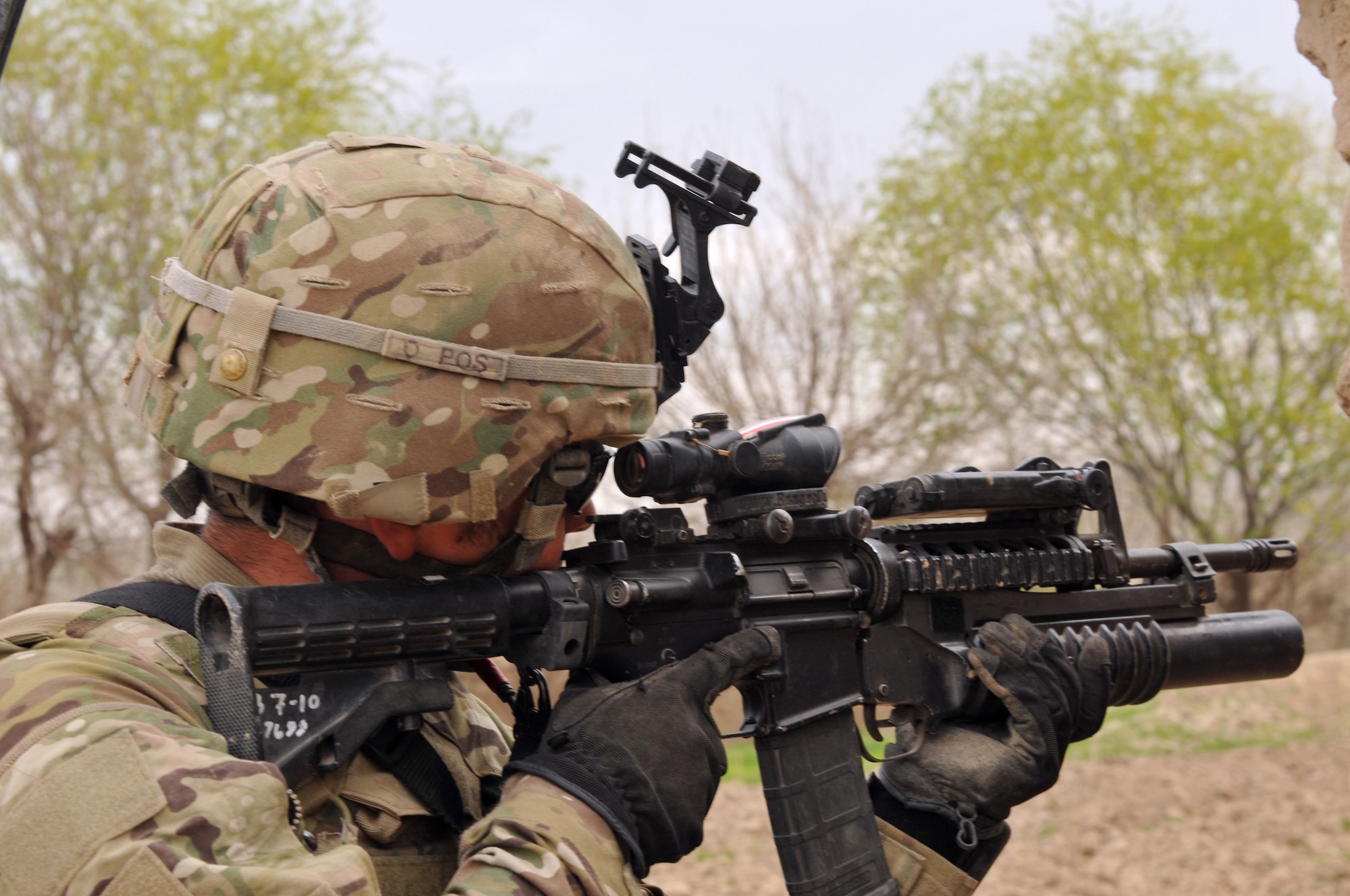 BALA MURGHAB, Afghanistan – Sgt. Jeff Sheppard, a Bulldog Troop, Red Platoon scout (7th Squadron, 10th Cavalry Regiment), scans a village for insurgent activity during a foot patrol in northern Bala Murghab Valley, Baghdis Province, Afghanistan April 4, 2011. Moments after returning to a ceased compound once the patrol completed, insurgents launched a coordinated and accurate attack against the patrol, wounding Sheppard, three other Service members and a military working dog. The operation was successful and coalition forces destroyed insurgent compounds and improvised explosive device making facilities in the engagement. This photo was originally released April 7, 2011. (U.S. Air Force photo/Master Sgt. Kevin Wallace)