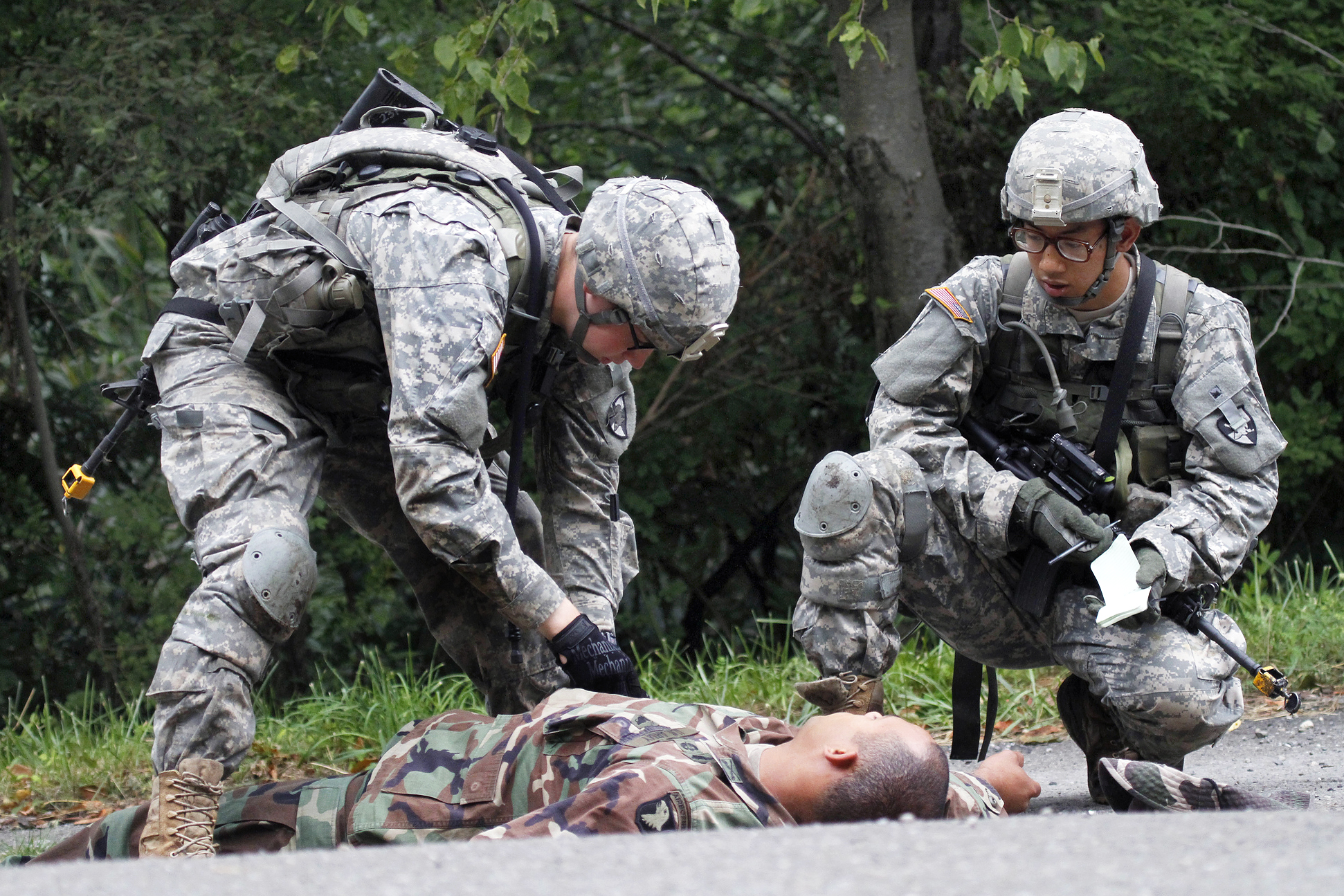 Army Cadets Search For Information On A Simulated Casualty During