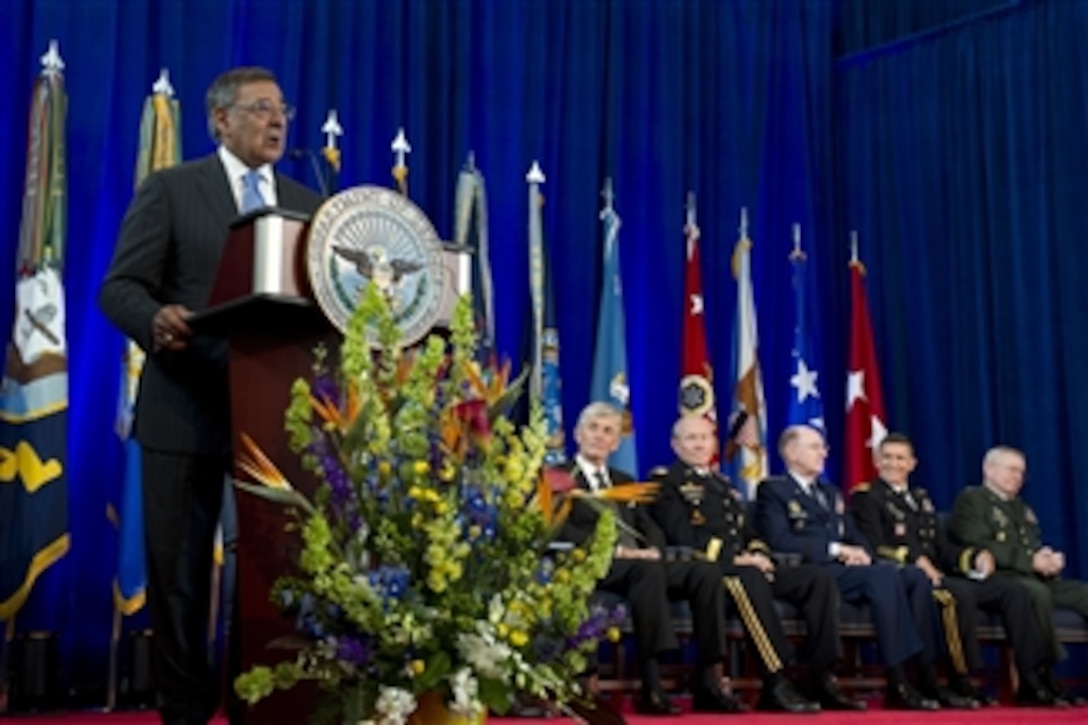 Secretary of Defense Leon E. Panetta speaks at the Defense Intelligence Agency change of directorship at Joint Base Anacostia-Bolling on July 24, 2012.  Army Lt. Gen. Ronald Burgess Jr. is turning over directorship of the DIA to Lt. Gen. Michael Flynn.  