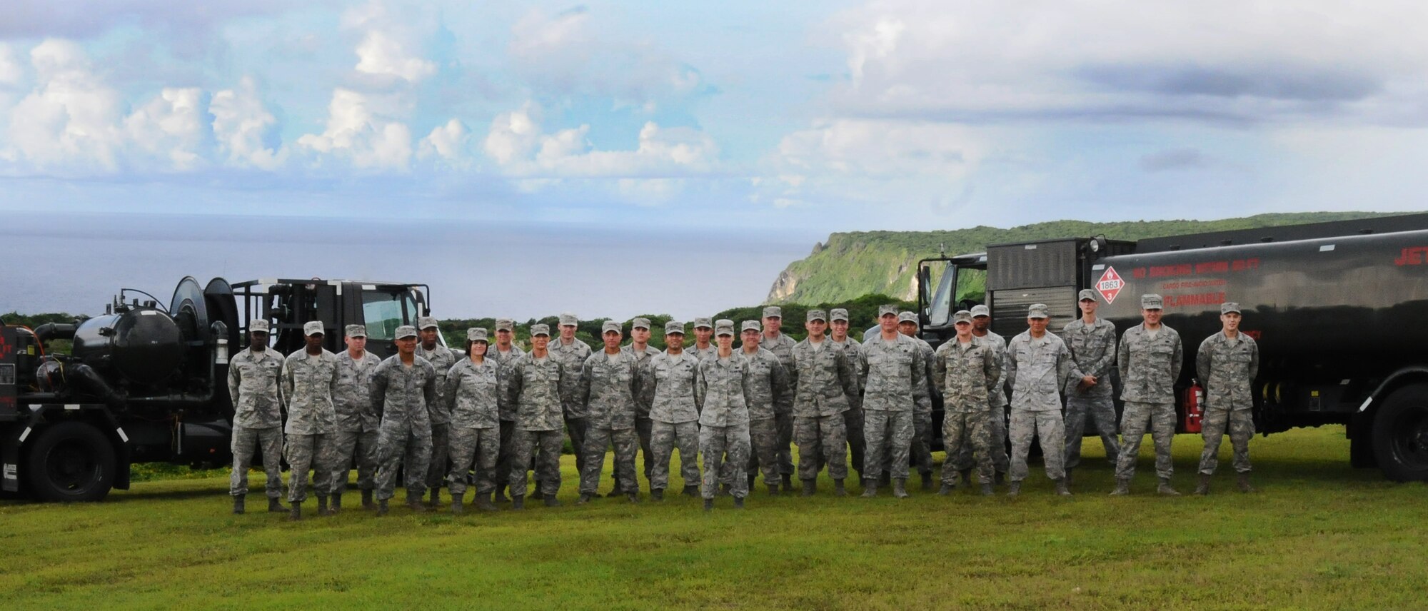 Airman 1st Class Priscilla Olivio, 36th Wing Logistics Readiness Squadron
fuels distribution operator (center), was awarded Team Andersen’s Best July 26. Team Andersen's Best is a recognition program which highlights a top performer from the 36th Wing. Each week, supervisors nominate a member of their team for outstanding performance and the wing commander presents the selected Airman/civilian with an award. To nominate your Airman/civilian for Andersen's Best, contact your unit chief or superintendent explaining their accomplishments. (U.S. Air Force photo by Senior Airman Carlin Leslie/Released)
