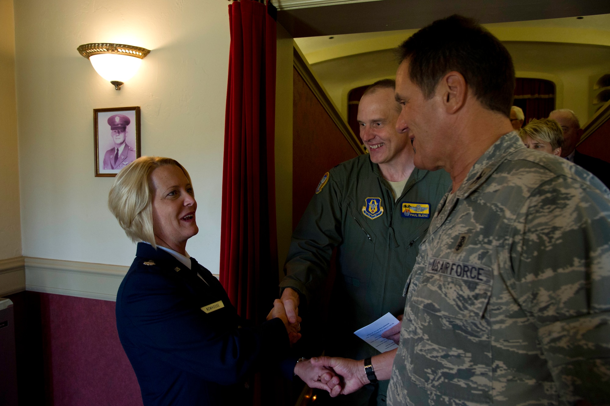 Lt. Col. Carolyn Newhouse takes command of the 452d Aeromedical Evacuation Squadron on July 21 during an assumption of command ceremony in the Cultural Resource Center. Col. Mark Sigler, 452d Operations Group commander, was the presiding officer for the event. (U.S. Air Force photo by Staff Sgt. Matthew Smith)
