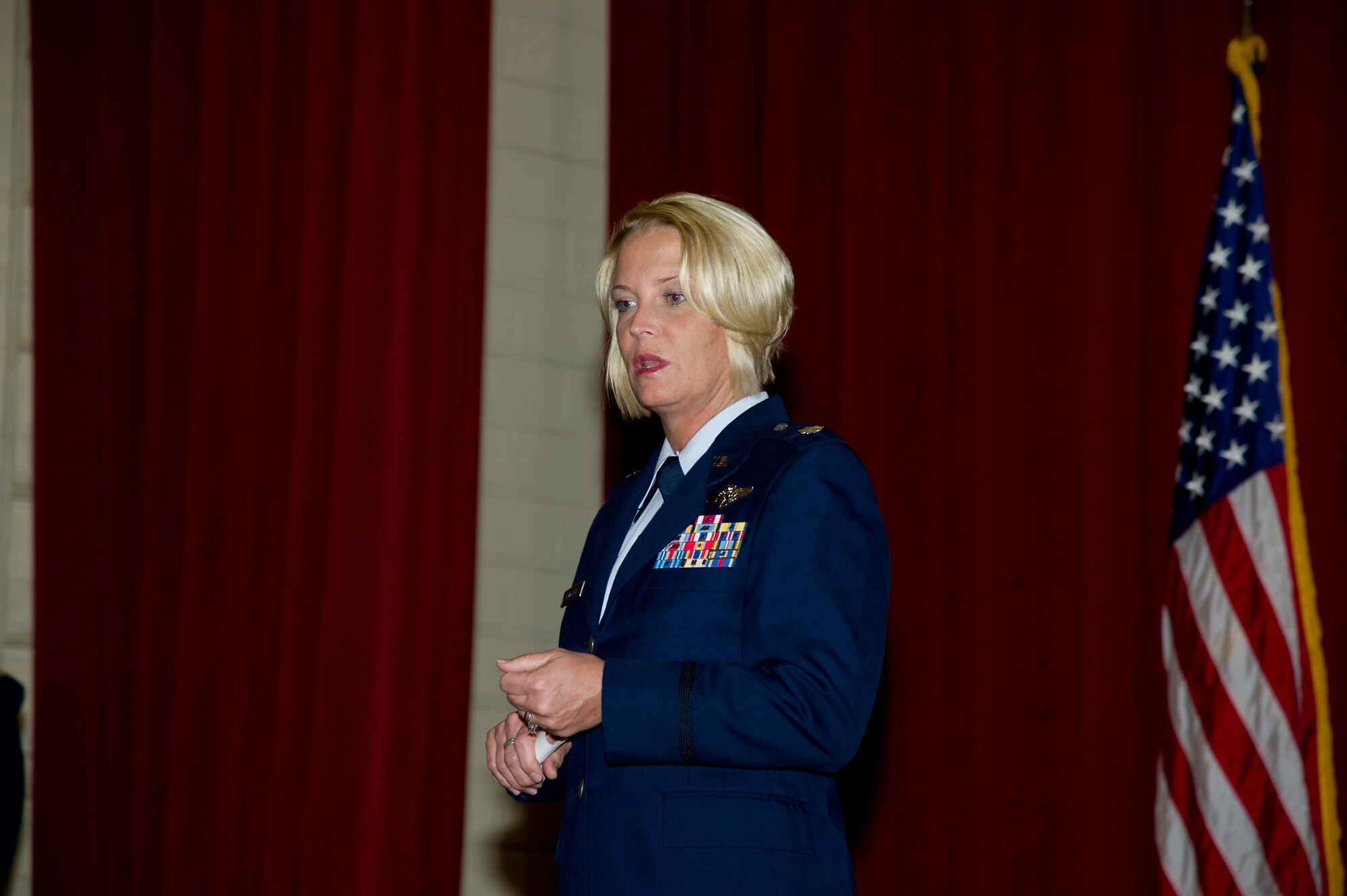 Lt. Col. Carolyn Newhouse takes command of the 452d Aeromedical Evacuation Squadron on July 21 during an assumption of command ceremony in the Cultural Resource Center. Col. Mark Sigler, 452d Operations Group commander, was the presiding officer for the event. (U.S. Air Force photo by Staff Sgt. Matthew Smith)