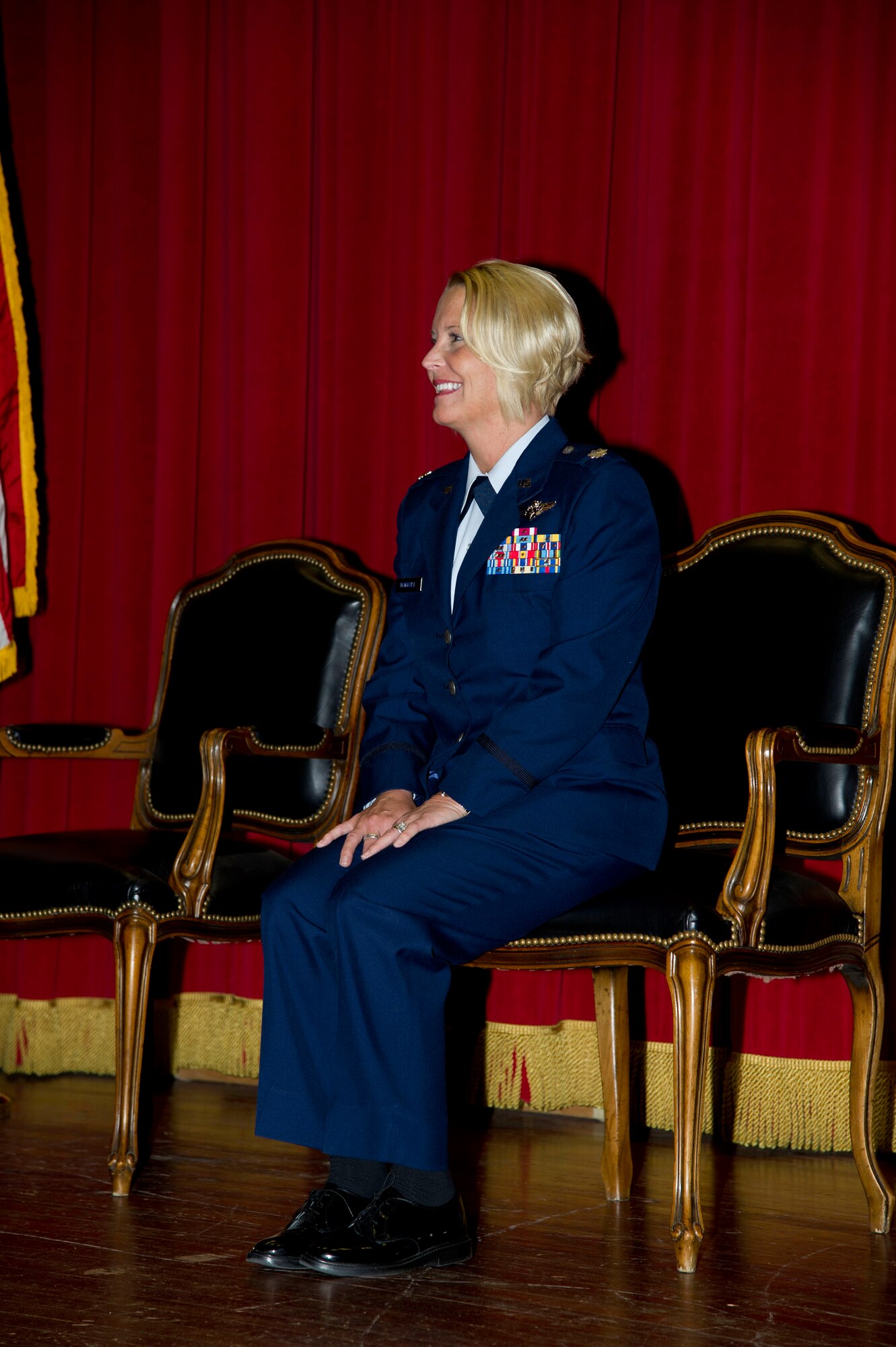 Lt. Col. Carolyn Newhouse takes command of the 452d Aeromedical Evacuation Squadron on July 21 during an assumption of command ceremony in the Cultural Resource Center. Col. Mark Sigler, 452d Operations Group commander, was the presiding officer for the event. (U.S. Air Force photo by Staff Sgt. Matthew Smith)