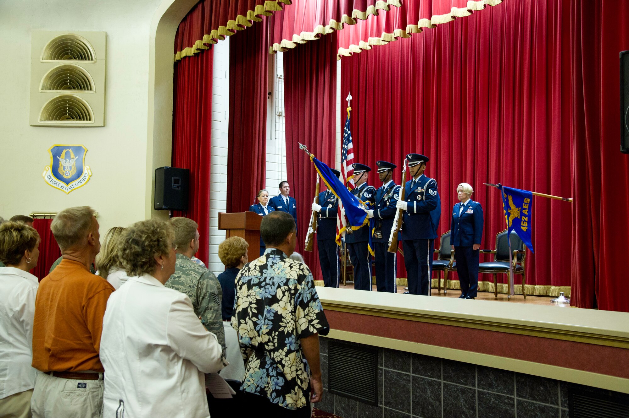 Lt. Col. Carolyn Newhouse takes command of the 452d Aeromedical Evacuation Squadron on July 21 during an assumption of command ceremony in the Cultural Resource Center. Col. Mark Sigler, 452d Operations Group commander, was the presiding officer for the event. (U.S. Air Force photo by Staff Sgt. Matthew Smith)
