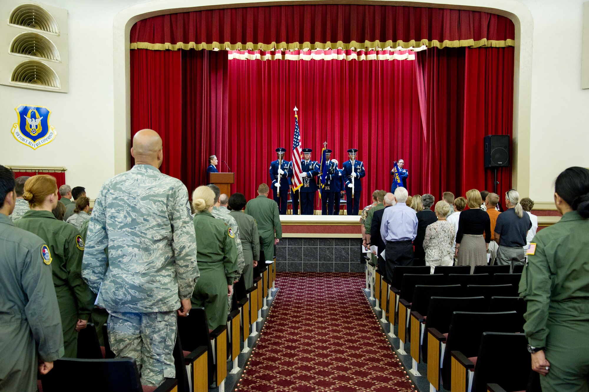 Lt. Col. Carolyn Newhouse takes command of the 452d Aeromedical Evacuation Squadron on July 21 during an assumption of command ceremony in the Cultural Resource Center. Col. Mark Sigler, 452d Operations Group commander, was the presiding officer for the event. (U.S. Air Force photo by Staff Sgt. Matthew Smith)