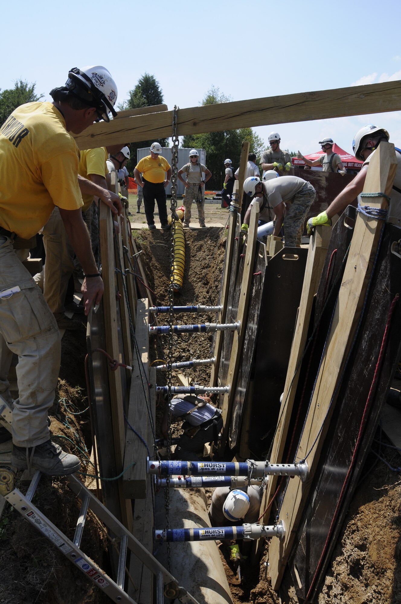 Guatemalan military leaders observe trench rescue operations during Urban Search and Rescue training at the 188th Fighter Wing July 11. The visit was part of the National Guard's State Partnership Program. (National Guard photo by Airman 1st Class Hannah Landeros/188th Fighter Wing Public Affairs)